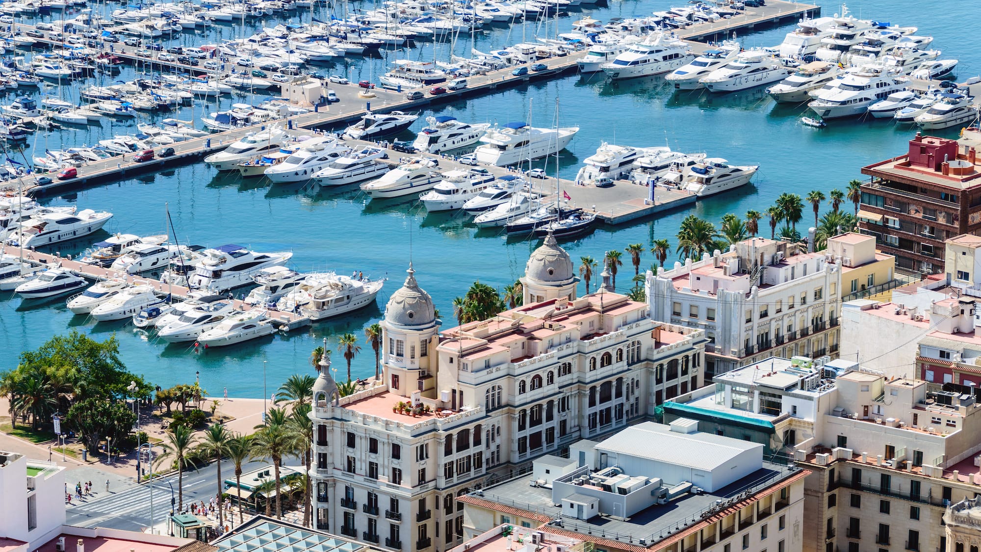 a large body of water with many boats and buildings