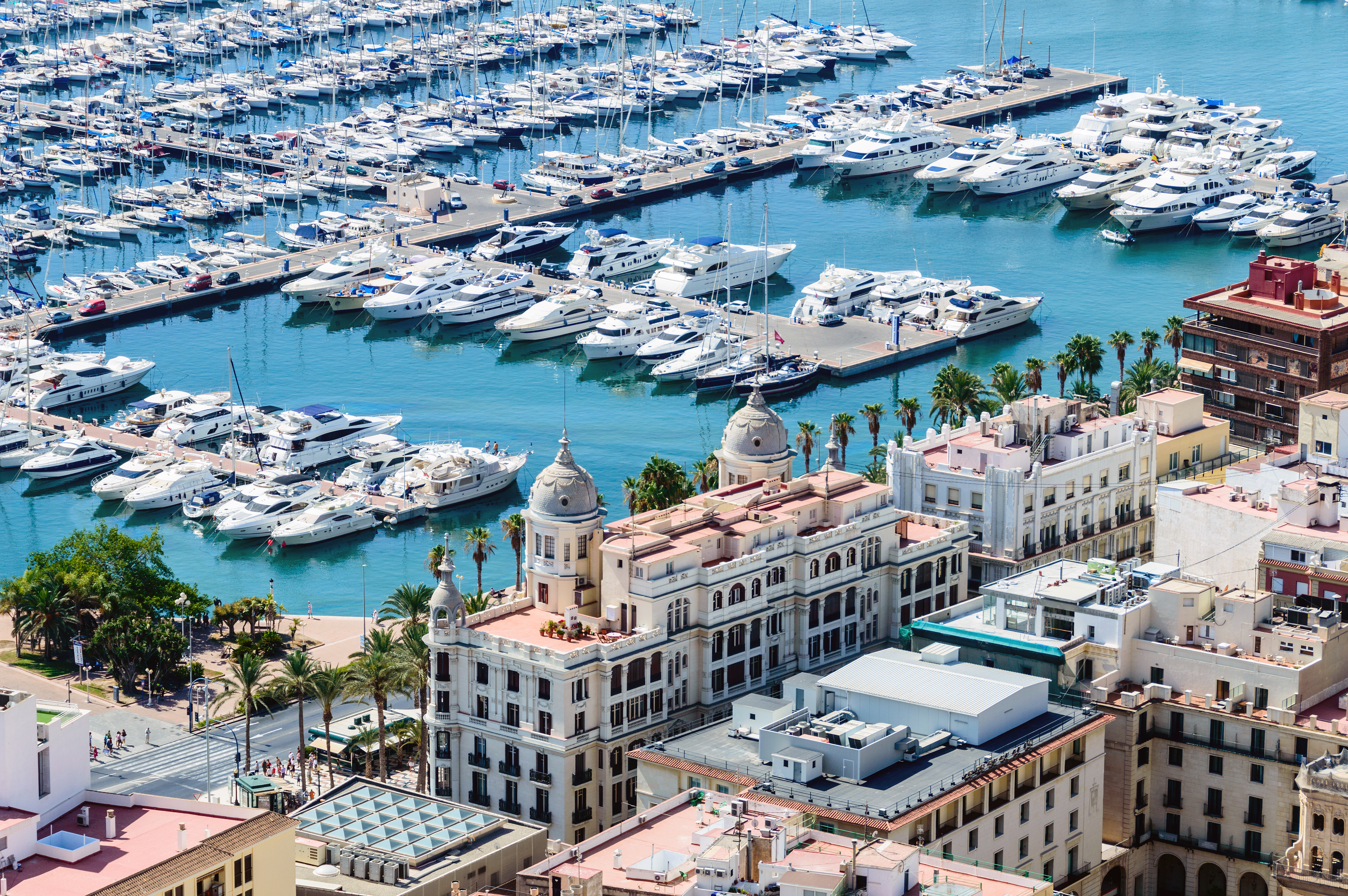 a large body of water with many boats and buildings