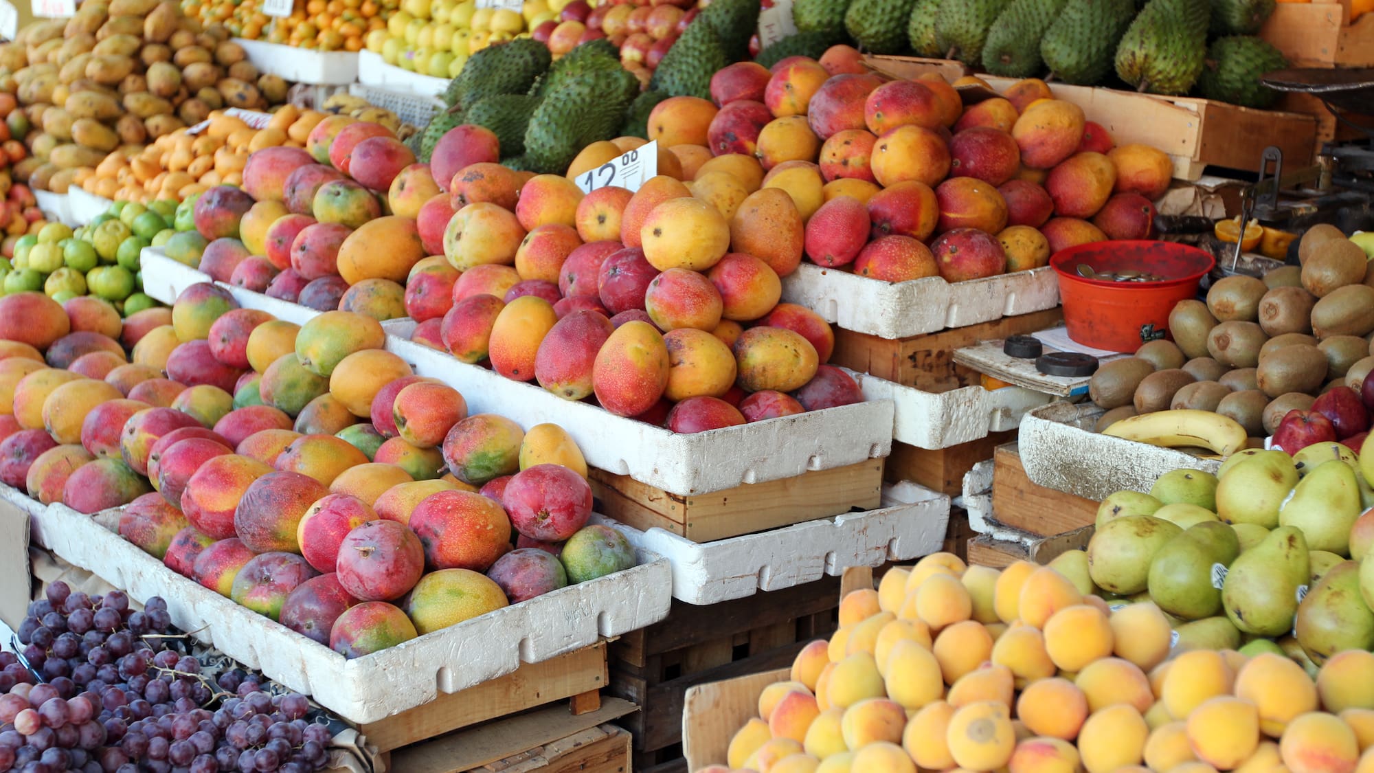 a group of fruit in boxes