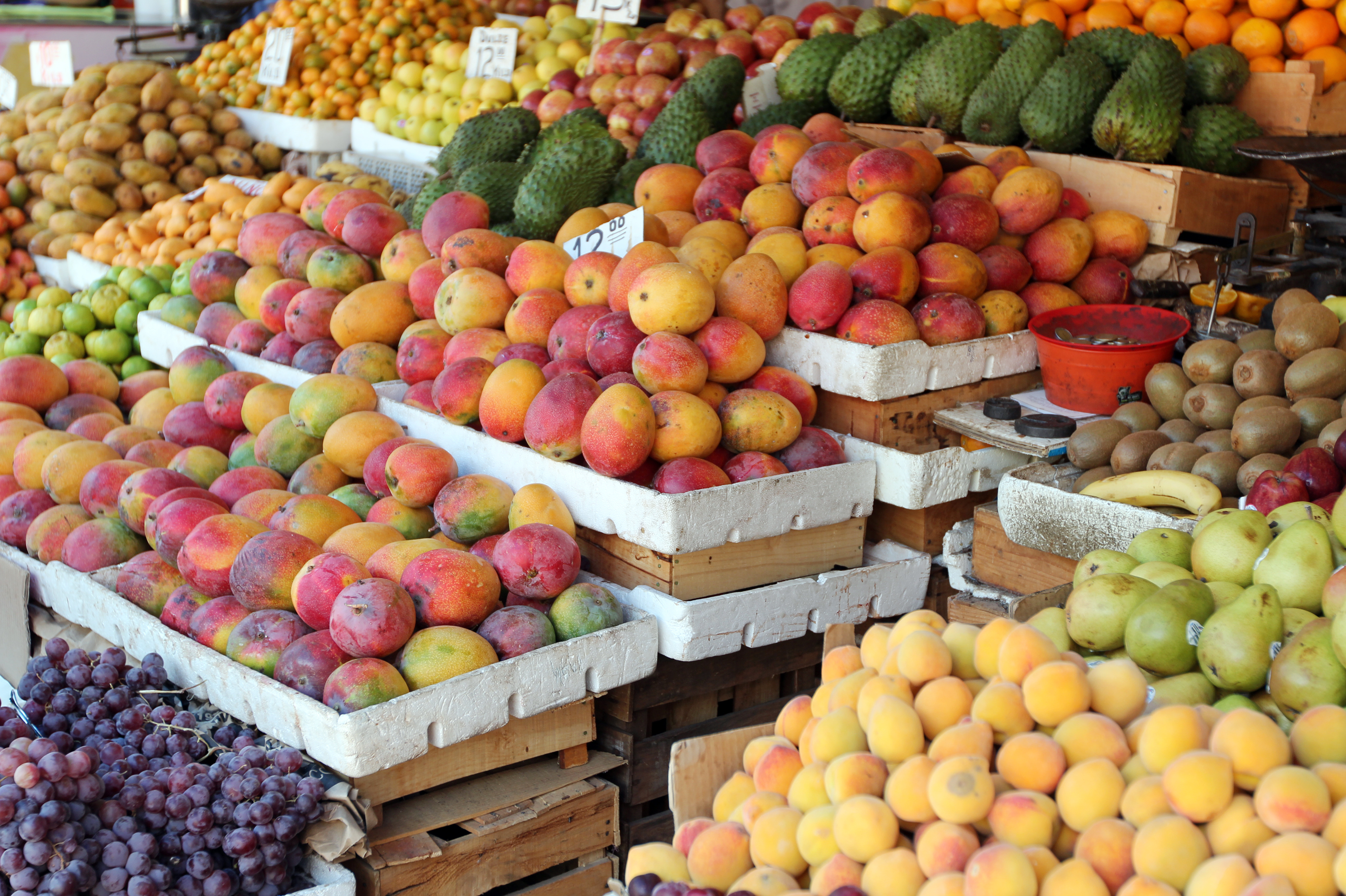 a group of fruit in boxes