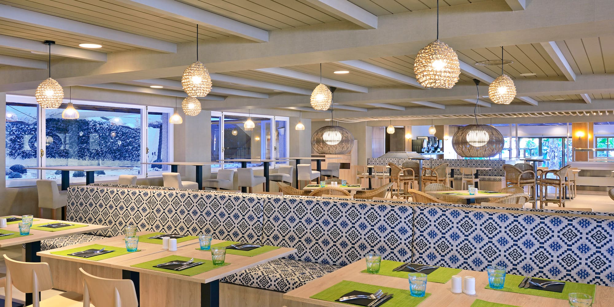 a restaurant with tables and chairs