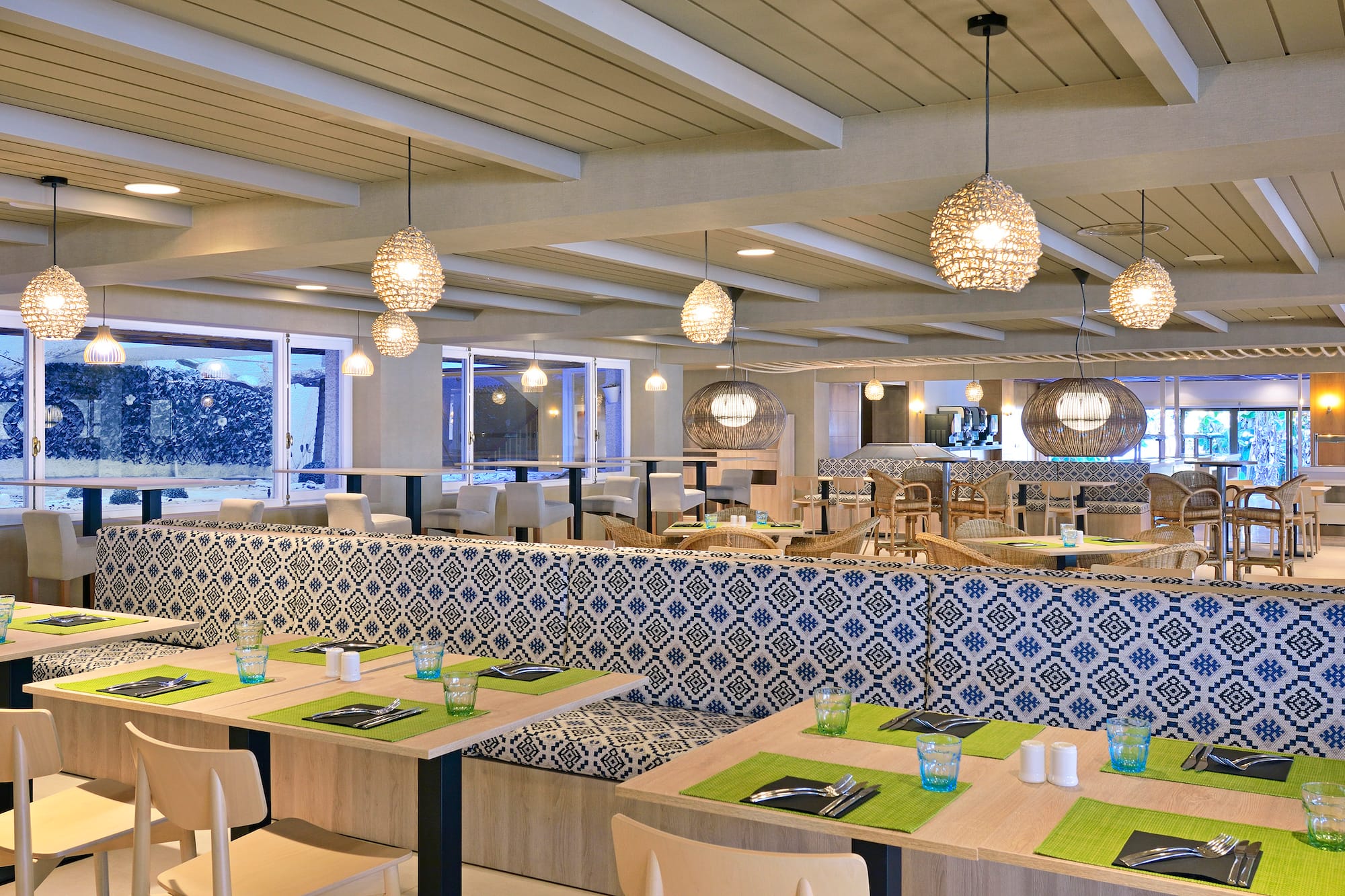 a restaurant with tables and chairs