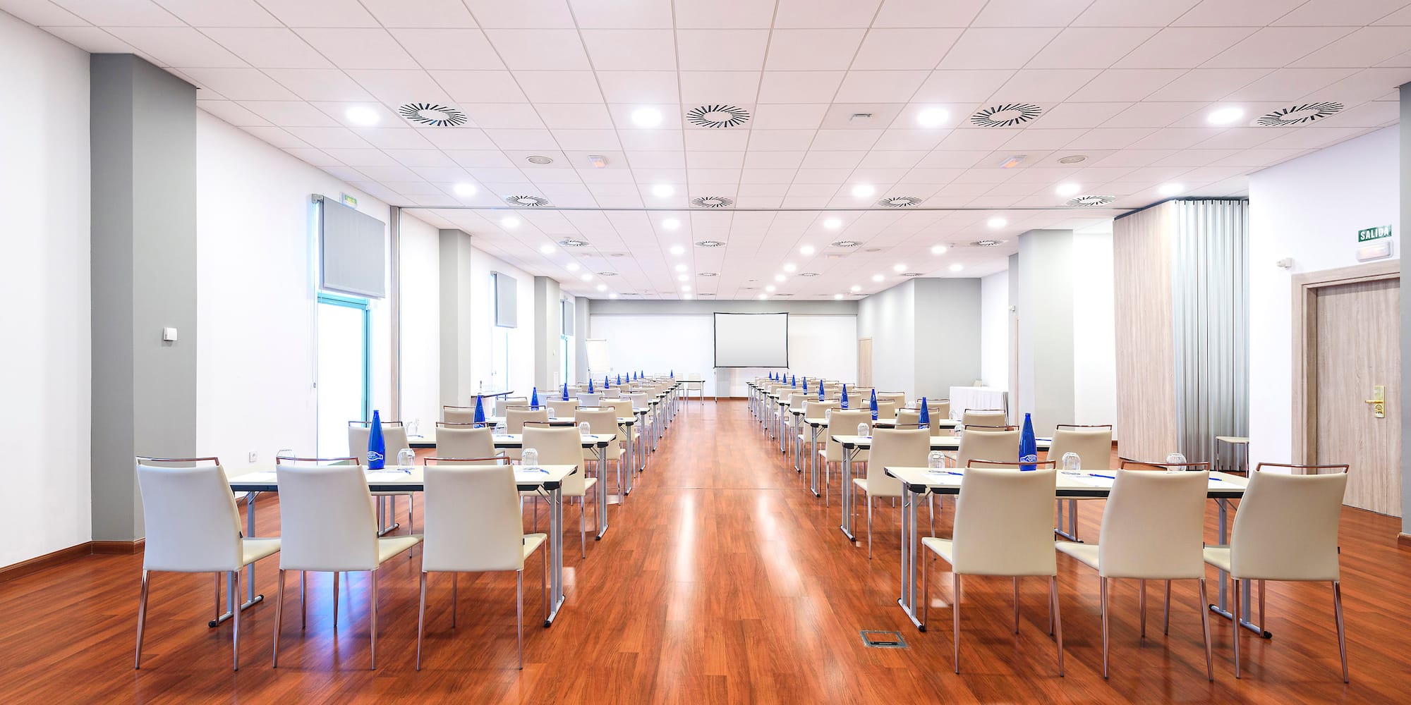 a room with tables and chairs