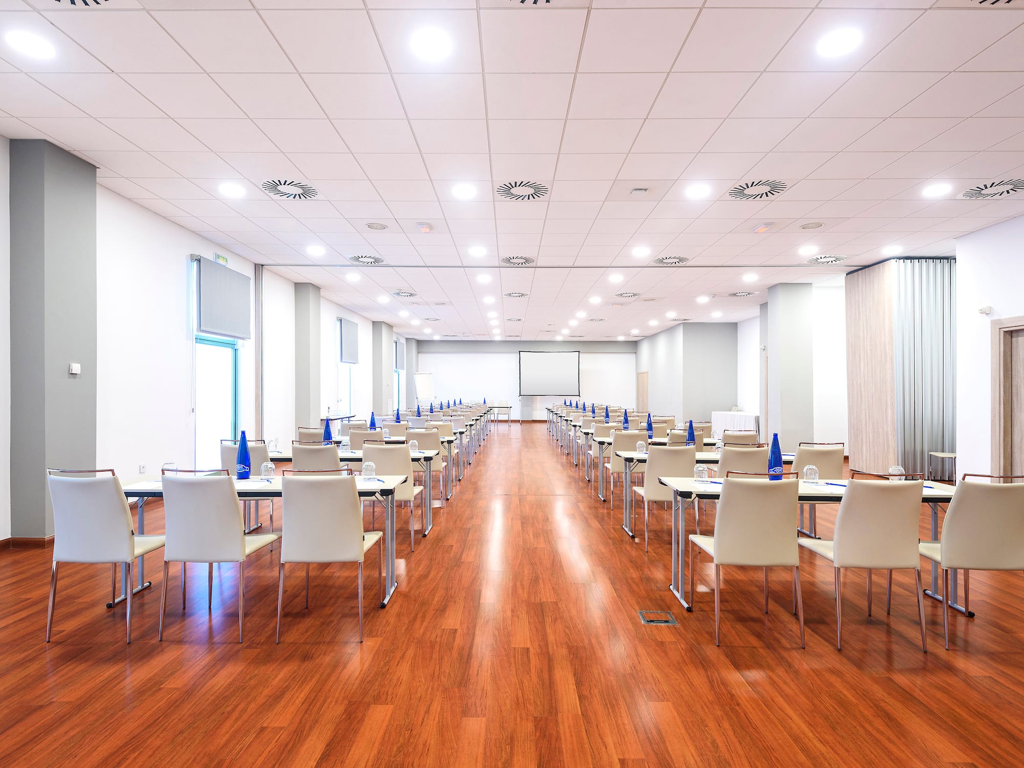 a room with tables and chairs