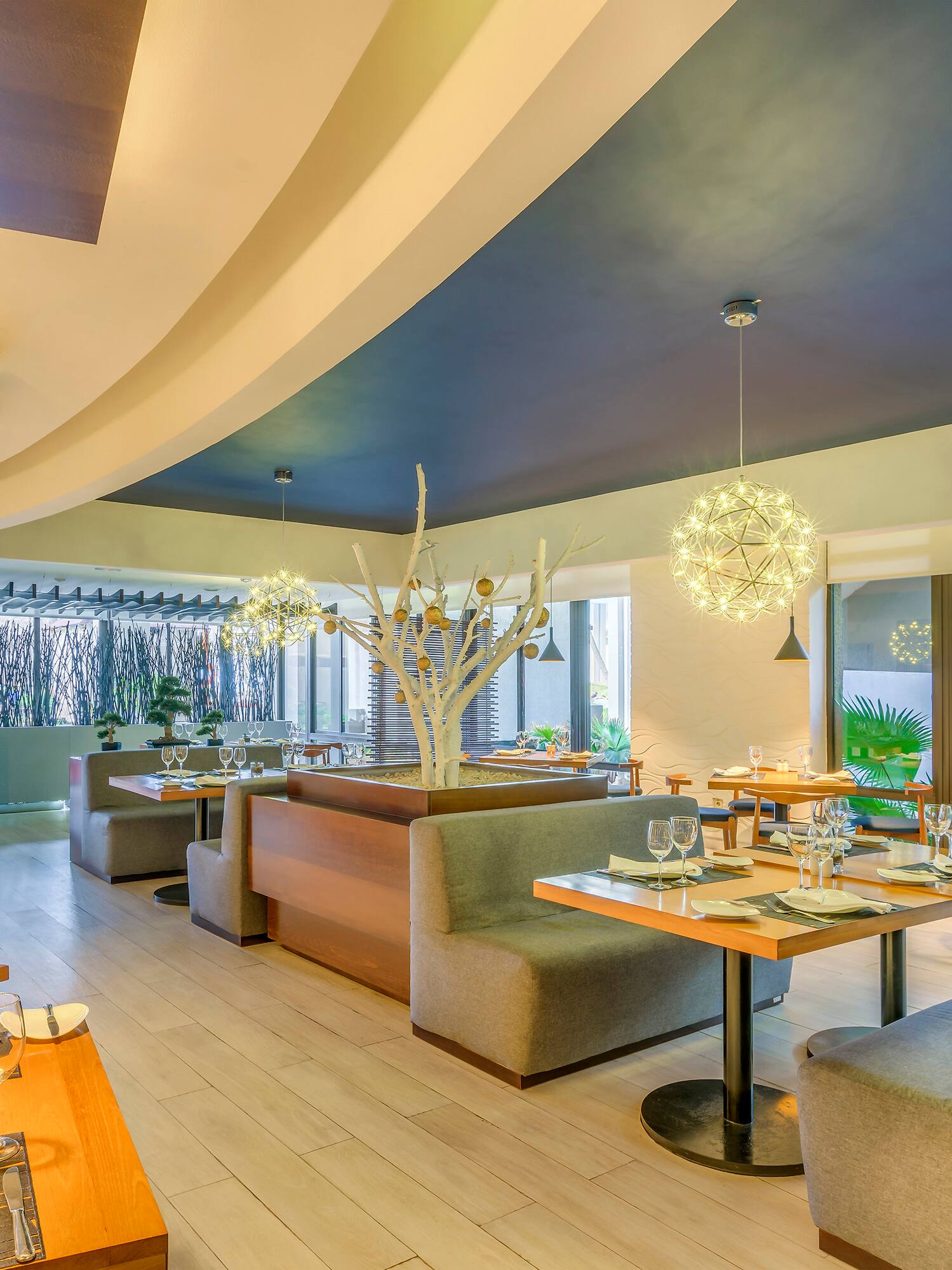 a restaurant with tables and chairs