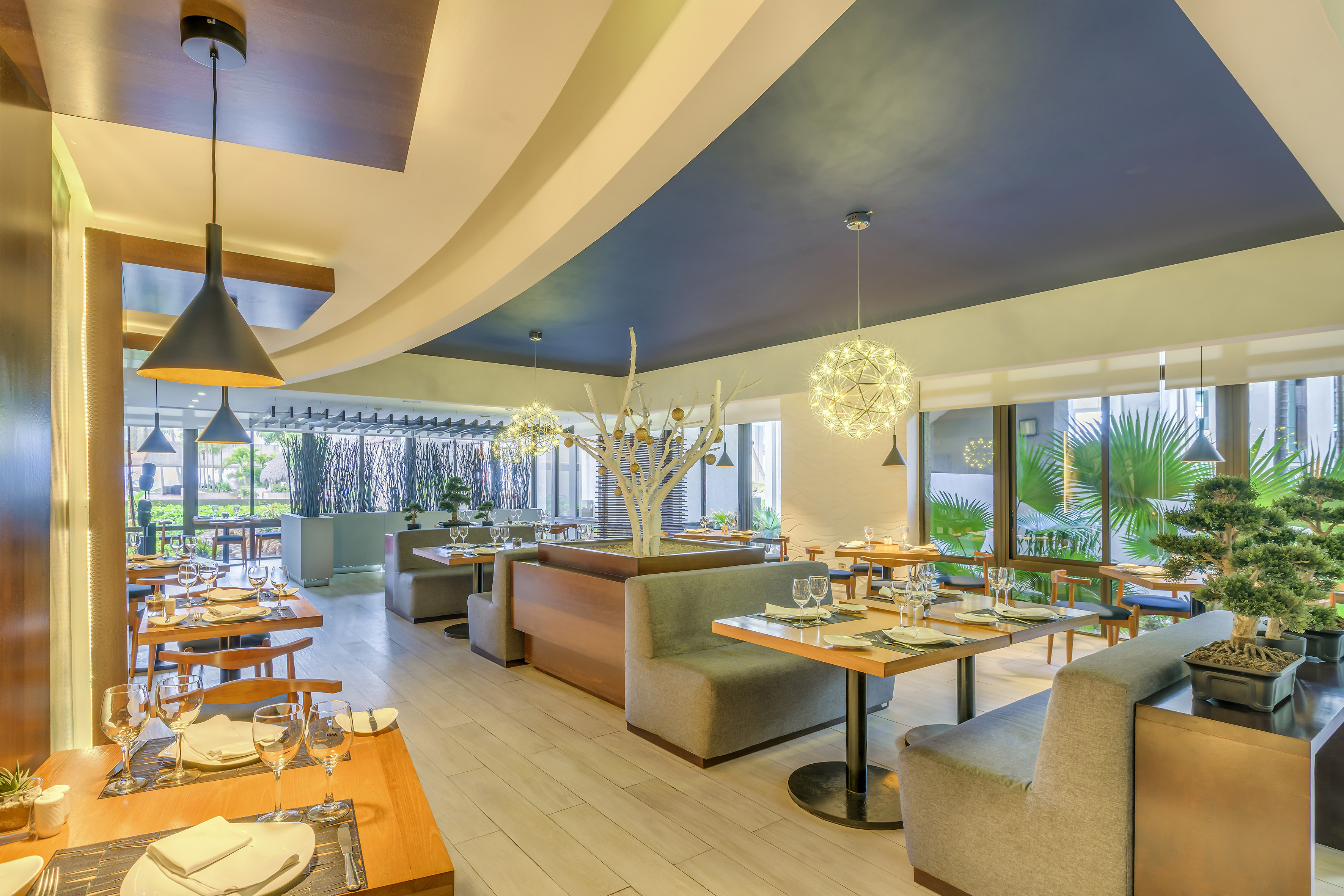 a restaurant with tables and chairs