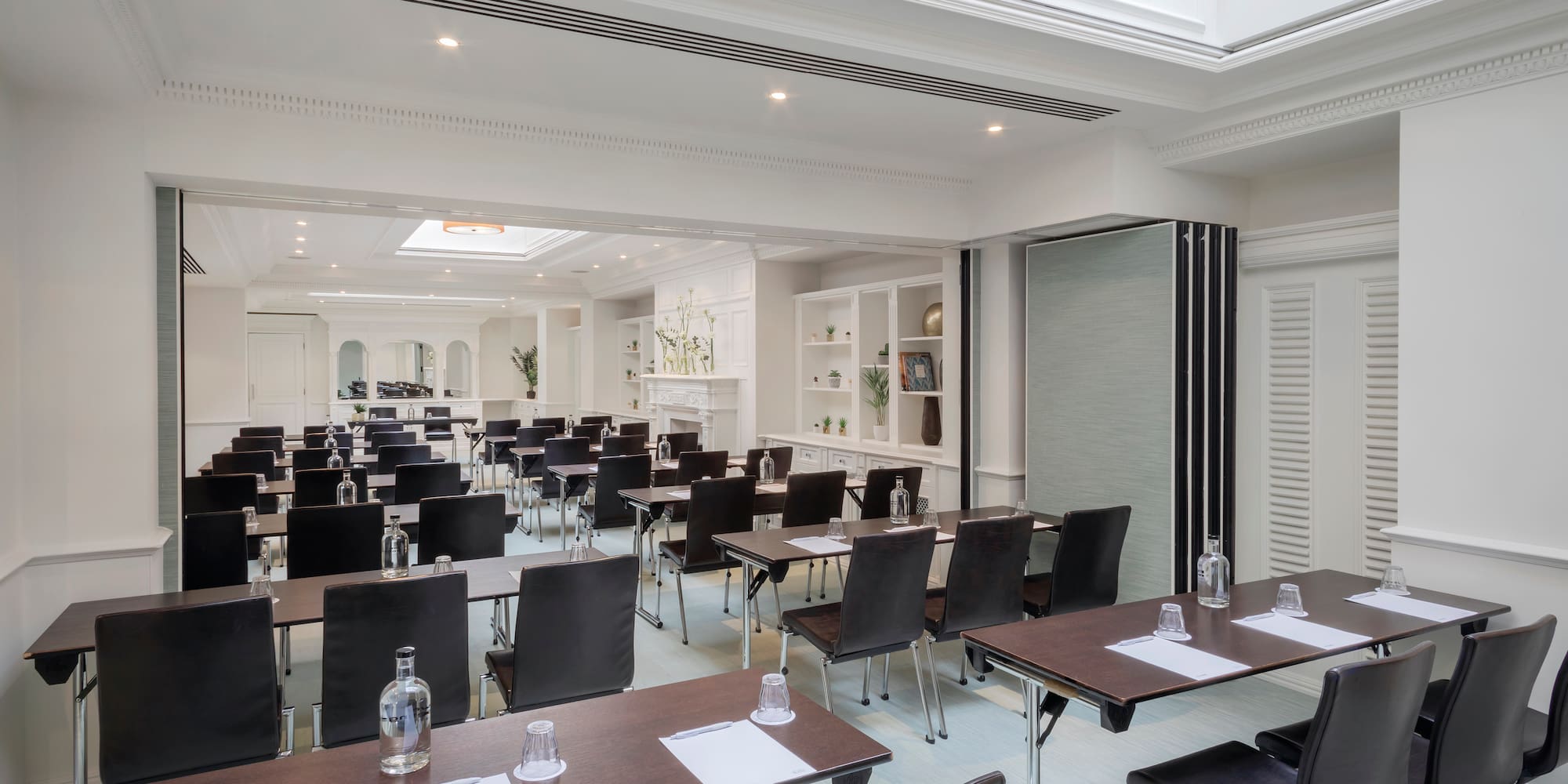 a room with tables and chairs