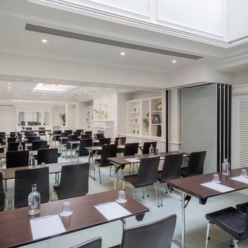 a room with tables and chairs