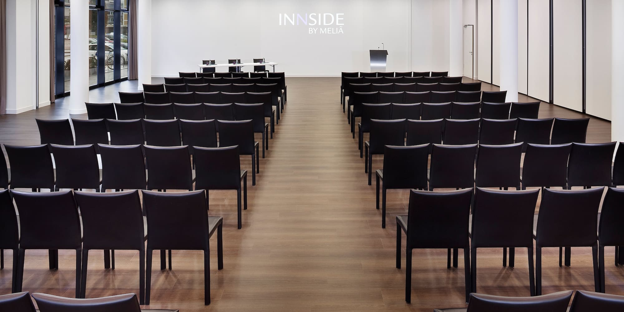 a room with rows of chairs