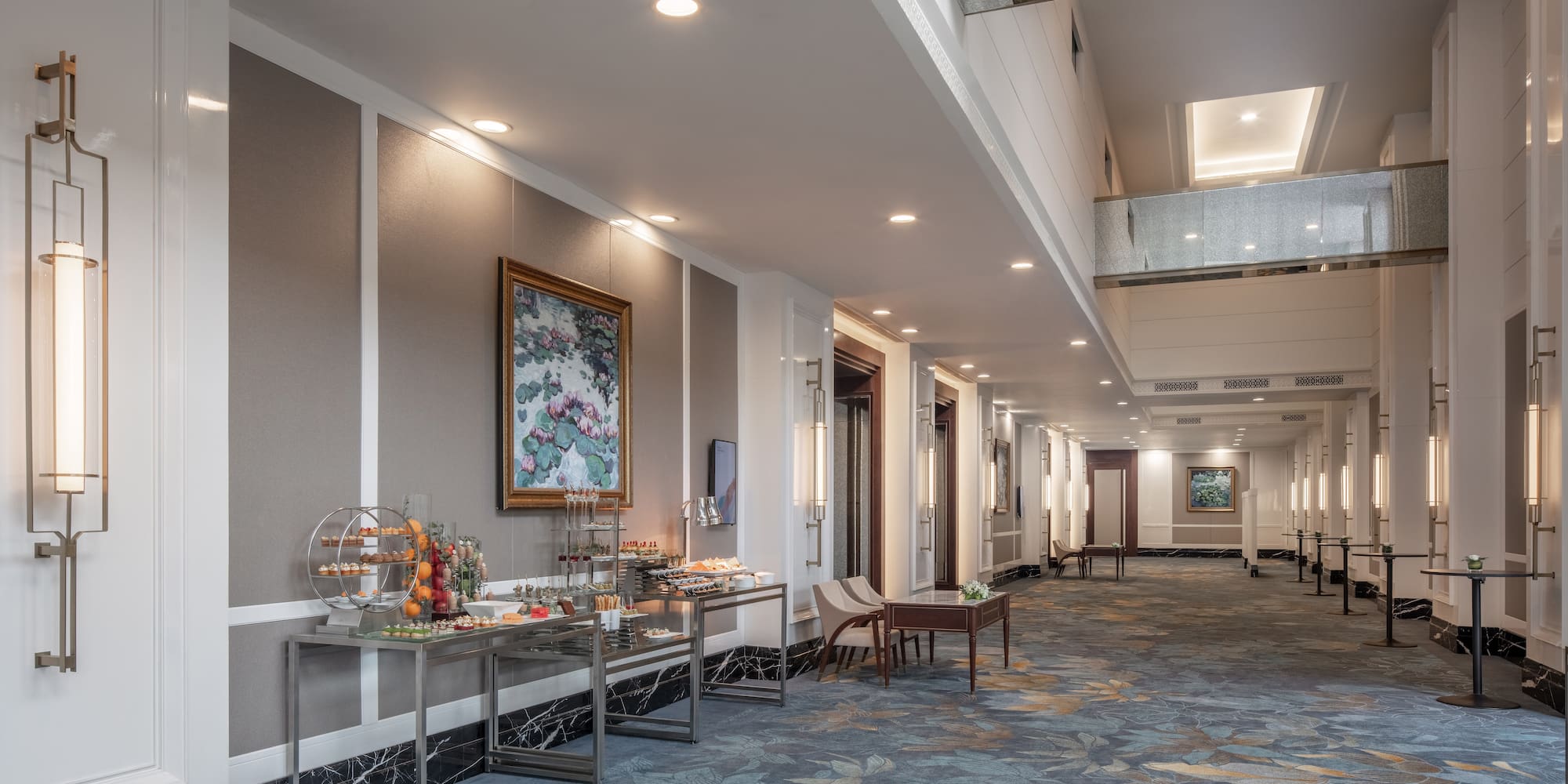 a room with a buffet table and chairs