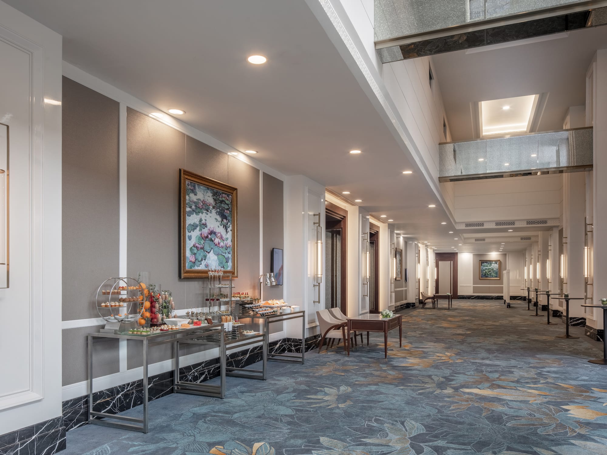 a room with a buffet table and chairs