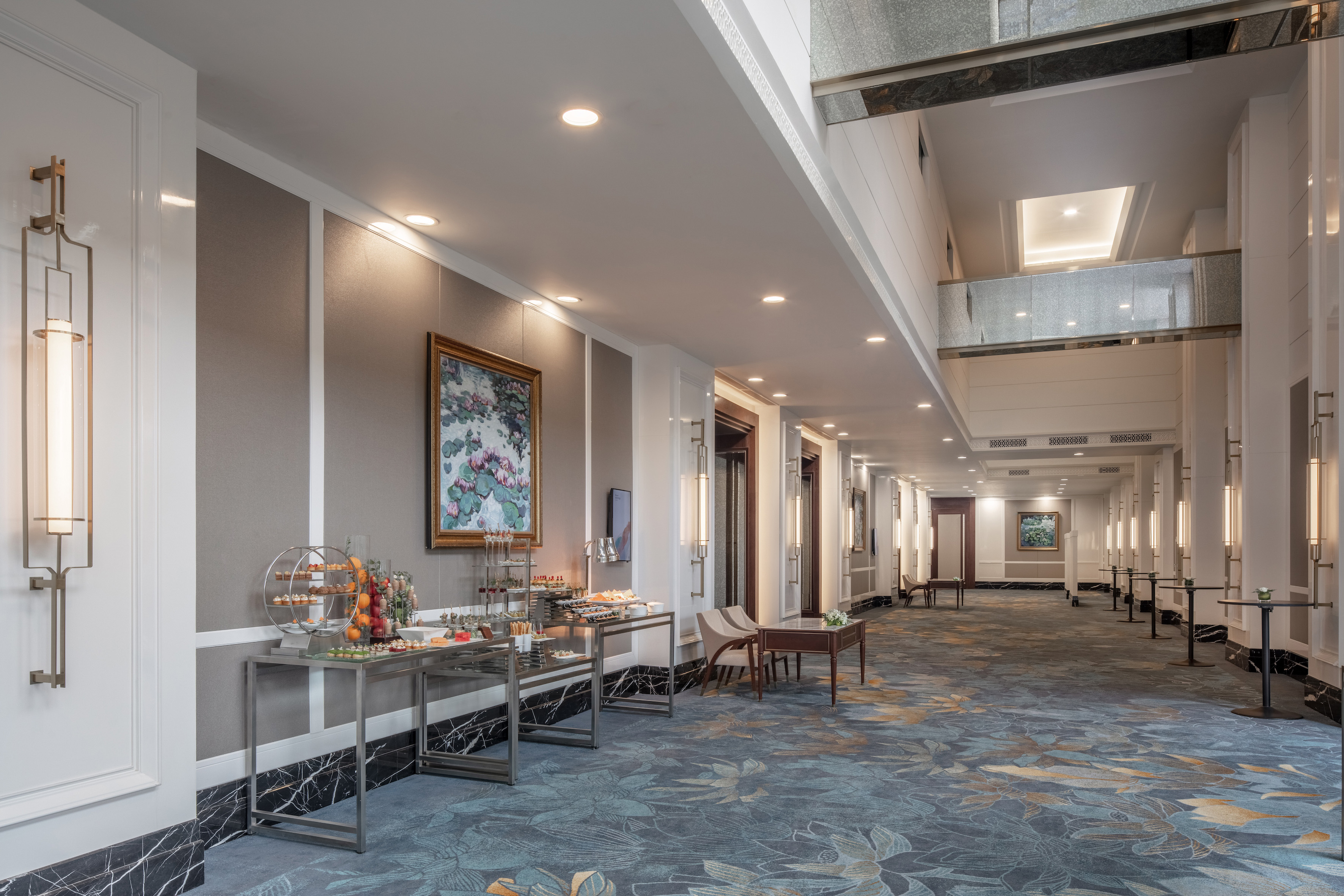 a room with a buffet table and chairs