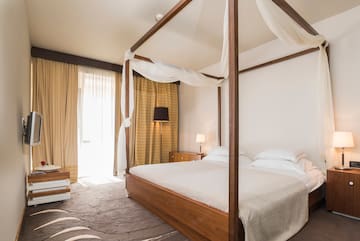 a bed with a canopy over it