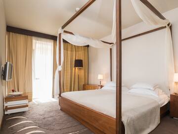 a bed with a canopy over it