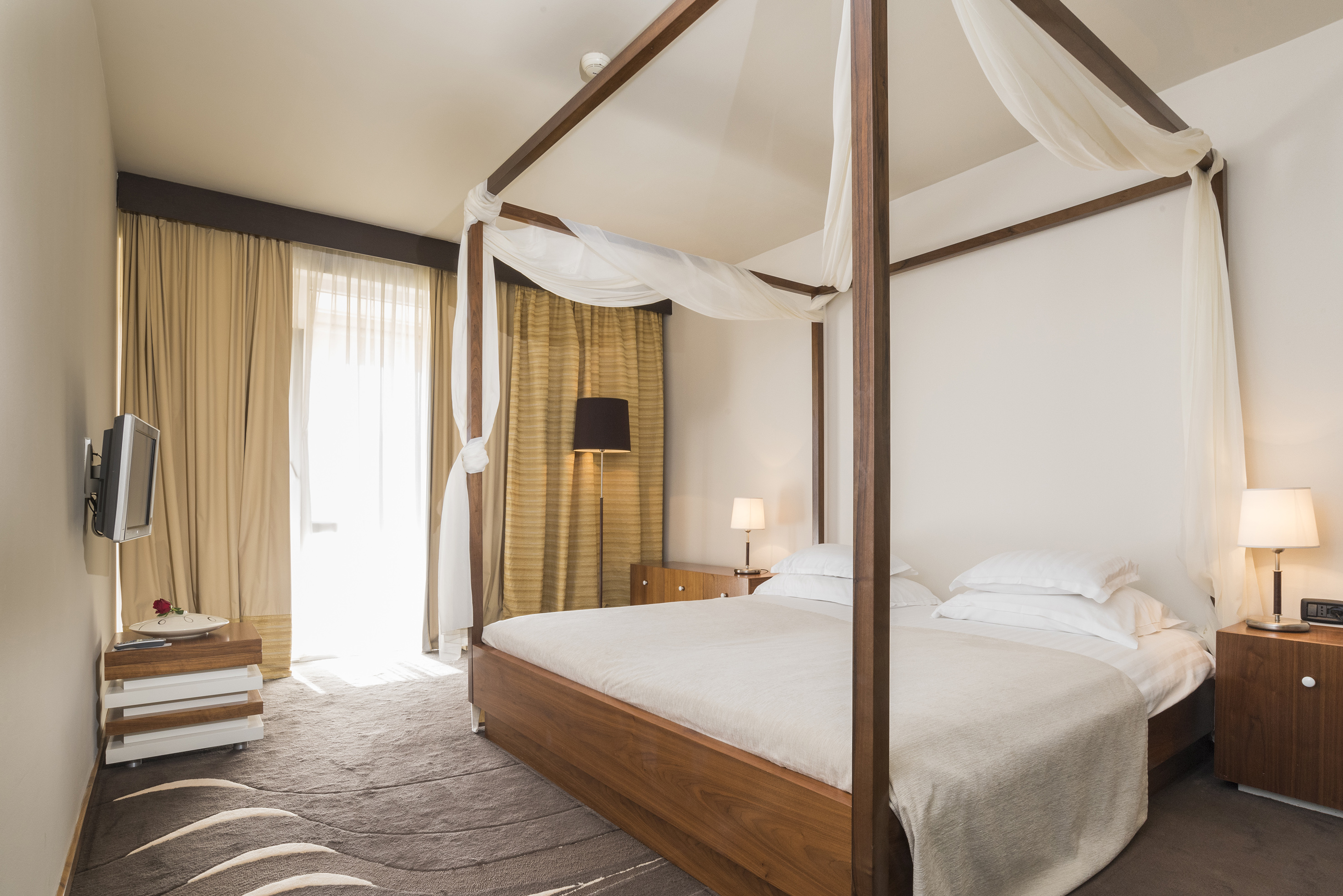 a bed with a canopy over it