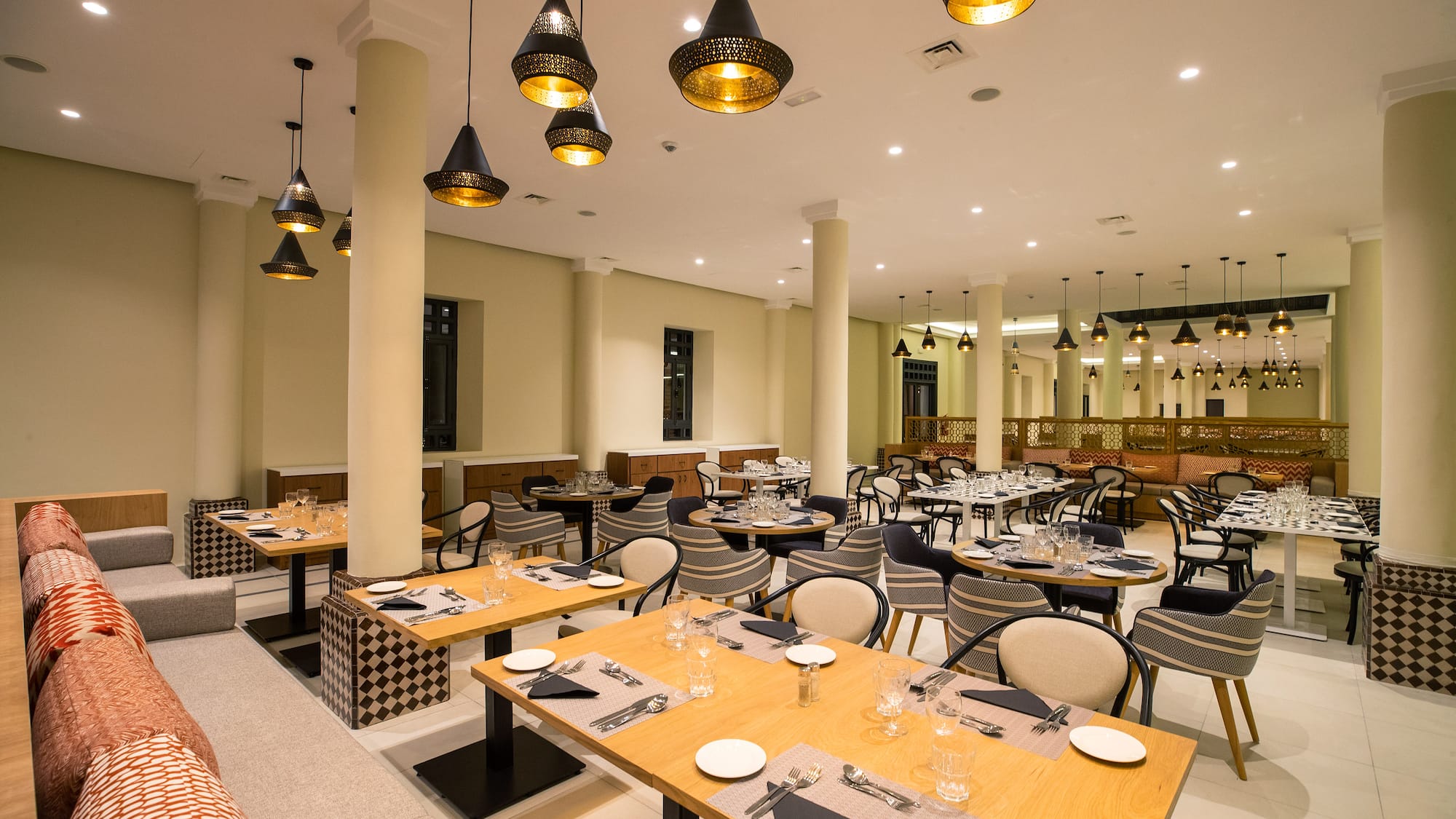 a room with tables and chairs