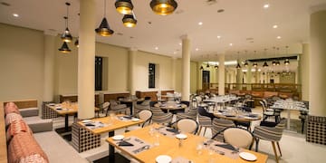 a room with tables and chairs