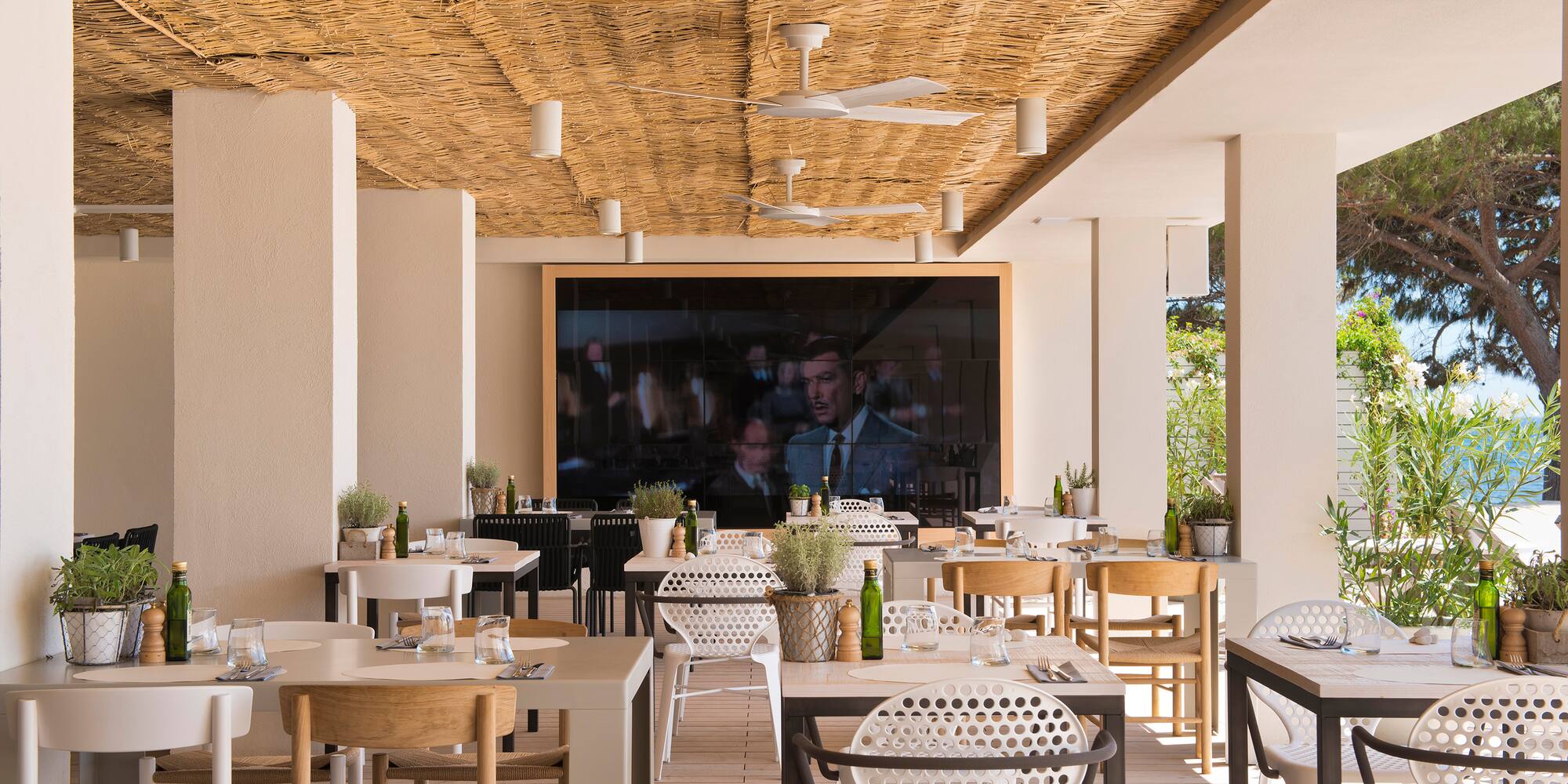 a restaurant with tables and chairs