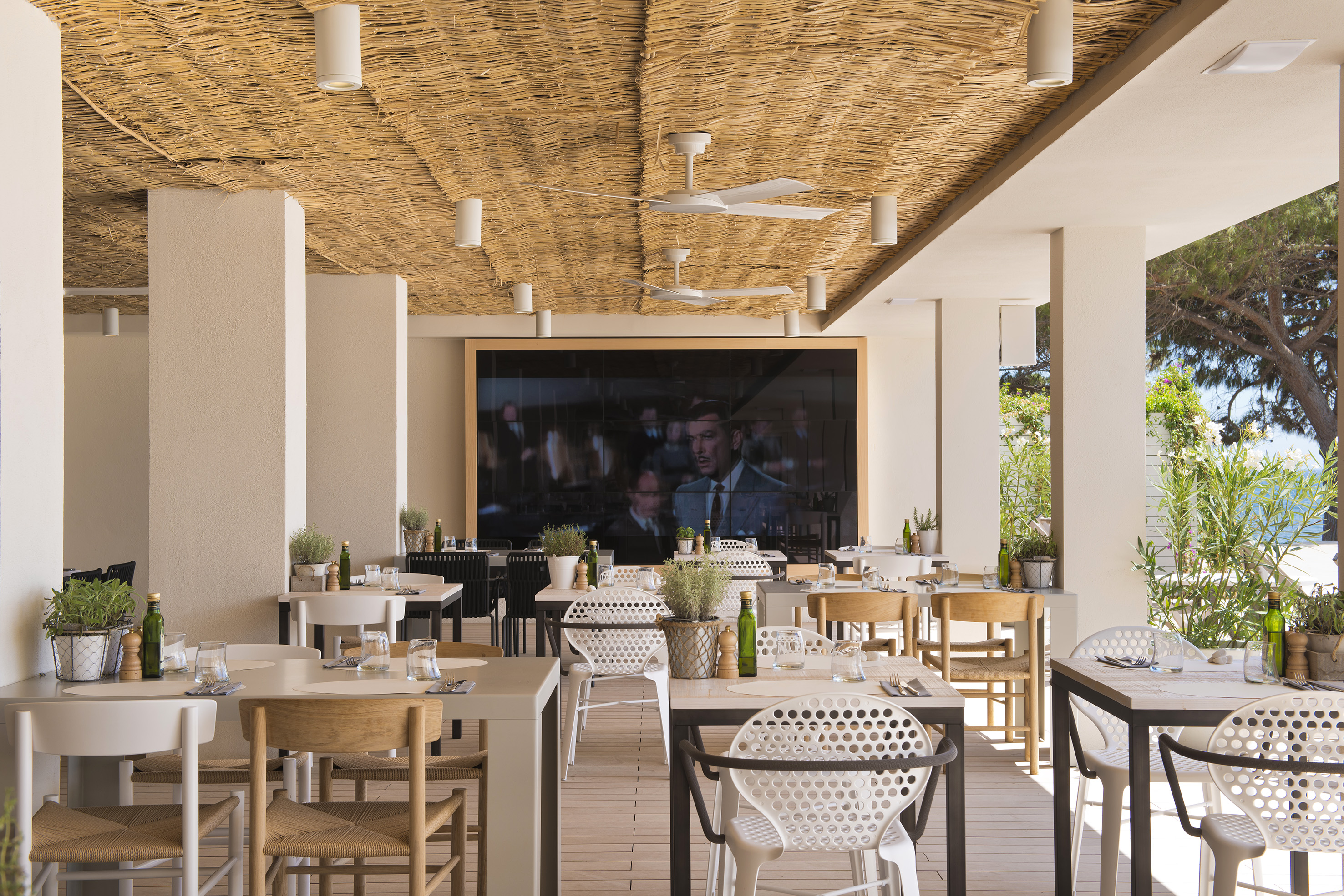 a restaurant with tables and chairs