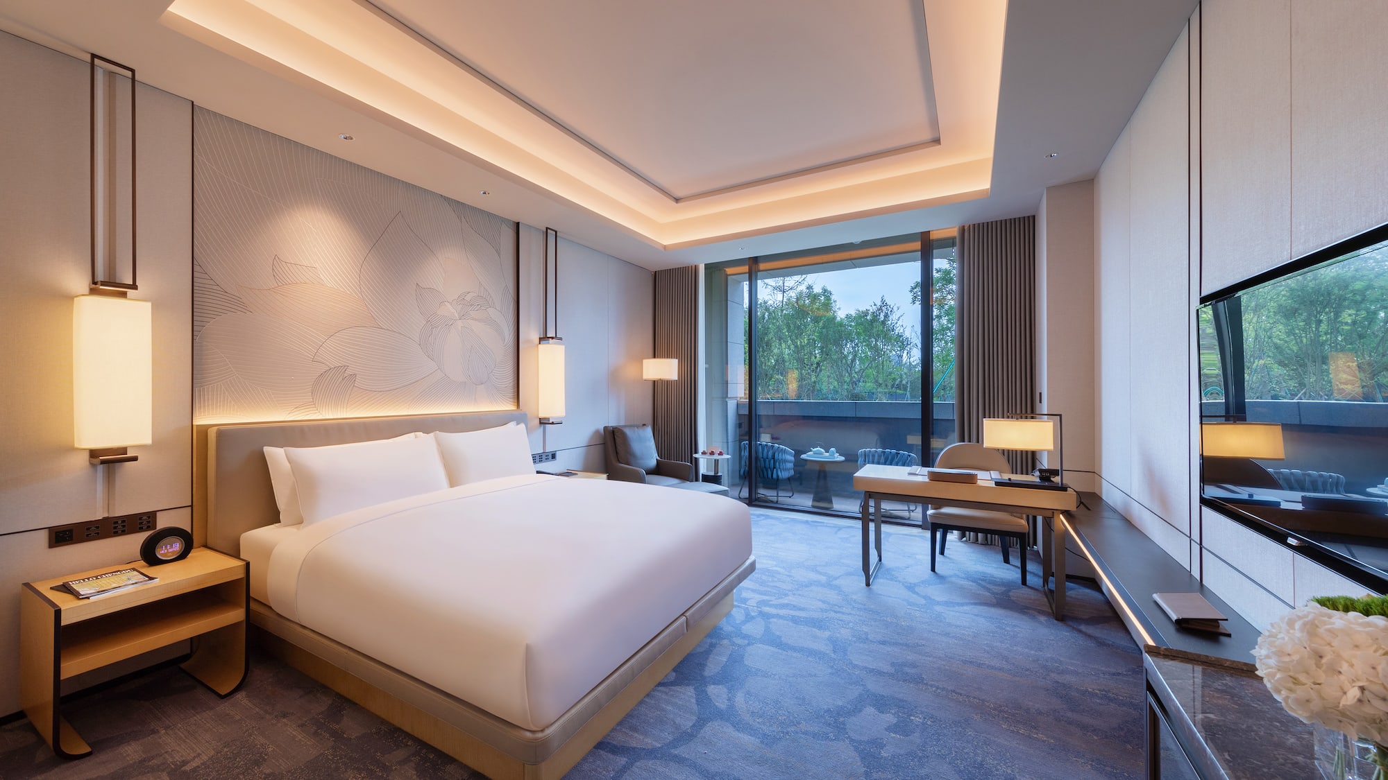 a room with a bed and a desk