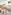 Muelle Uno Málaga: paseo con palmeras, gente, ferry y barcos en puerto.