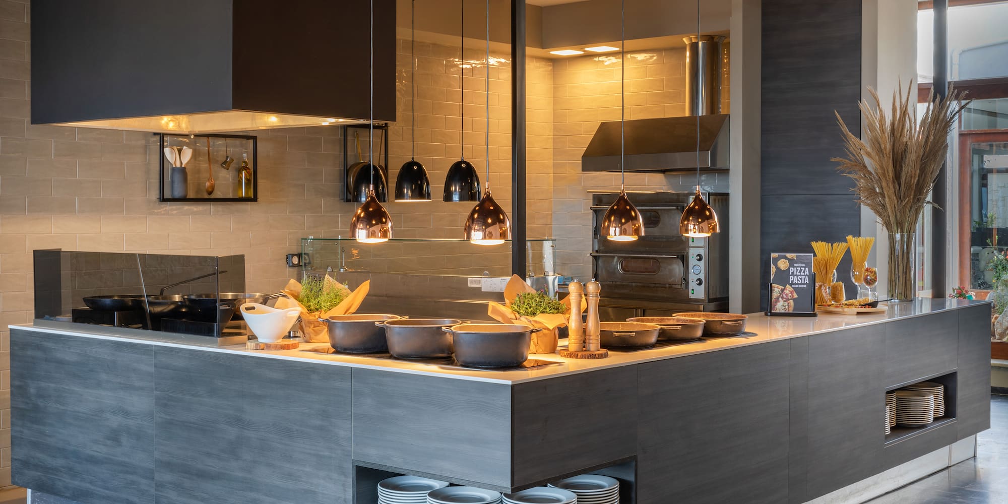 a kitchen with a large countertop and a large oven