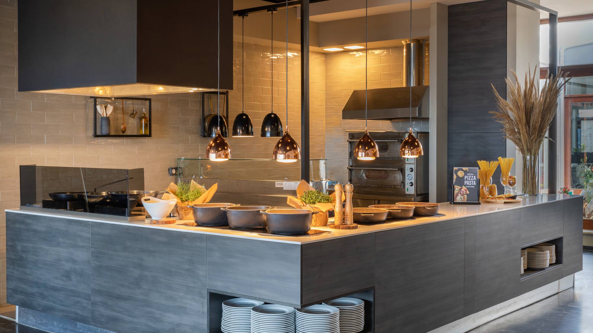 a kitchen with a large countertop and a large oven