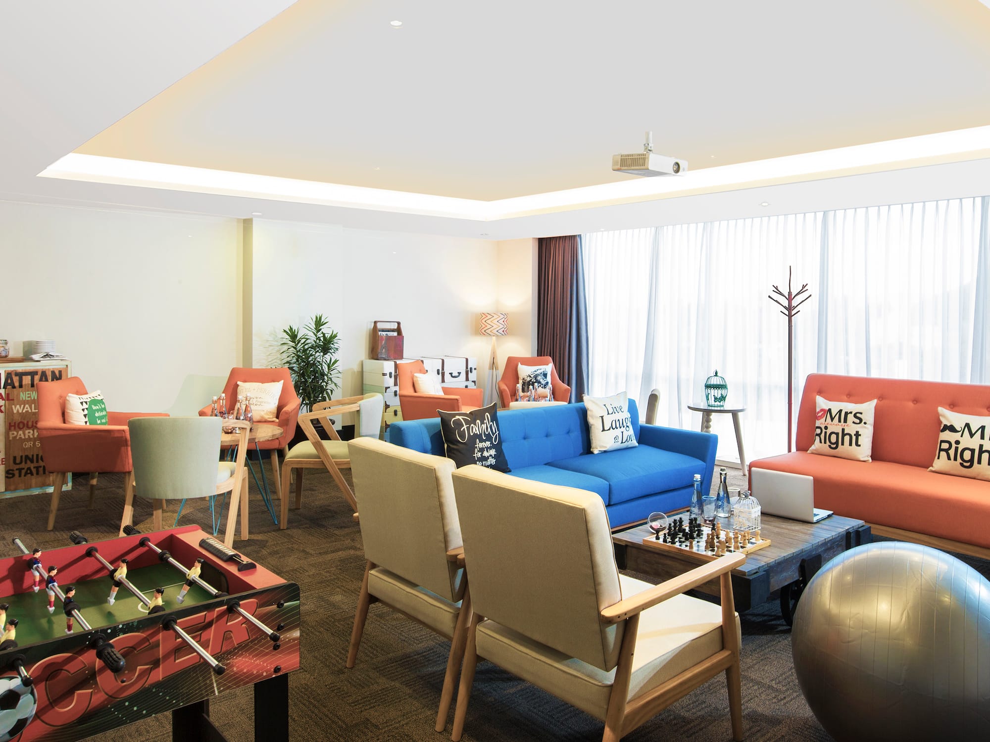 a room with a table and chairs