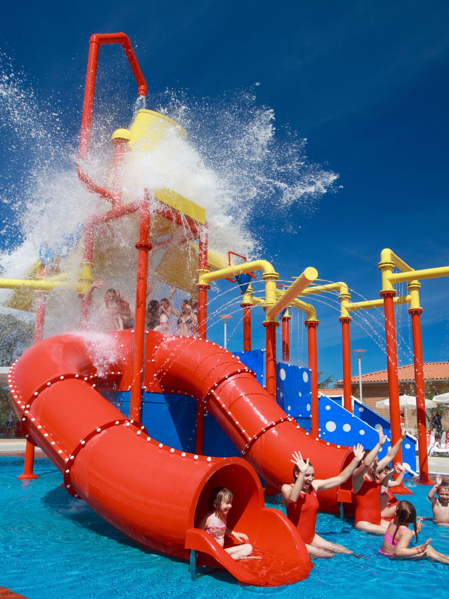 a group of kids in a water park