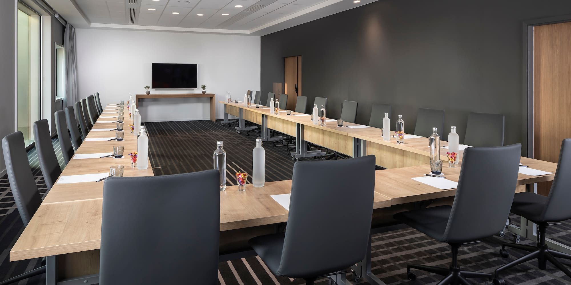 a room with a table and chairs