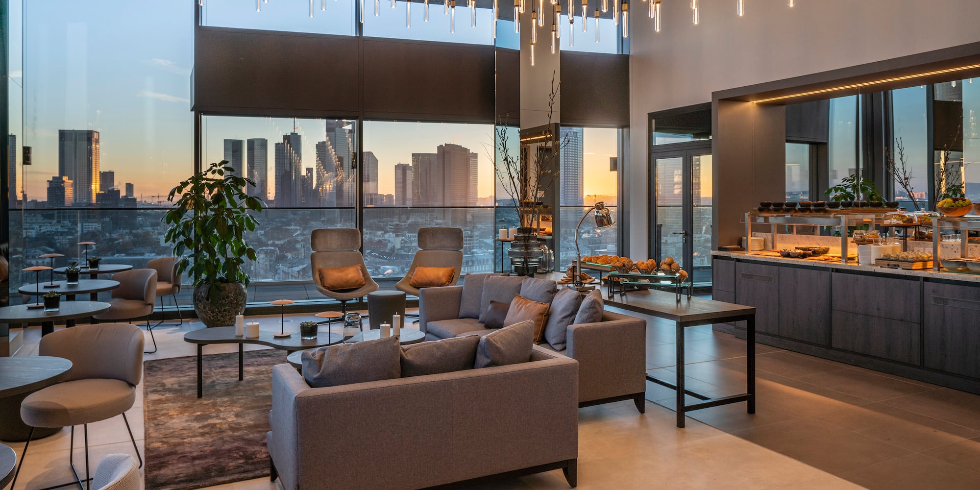 a living room with a large chandelier over it