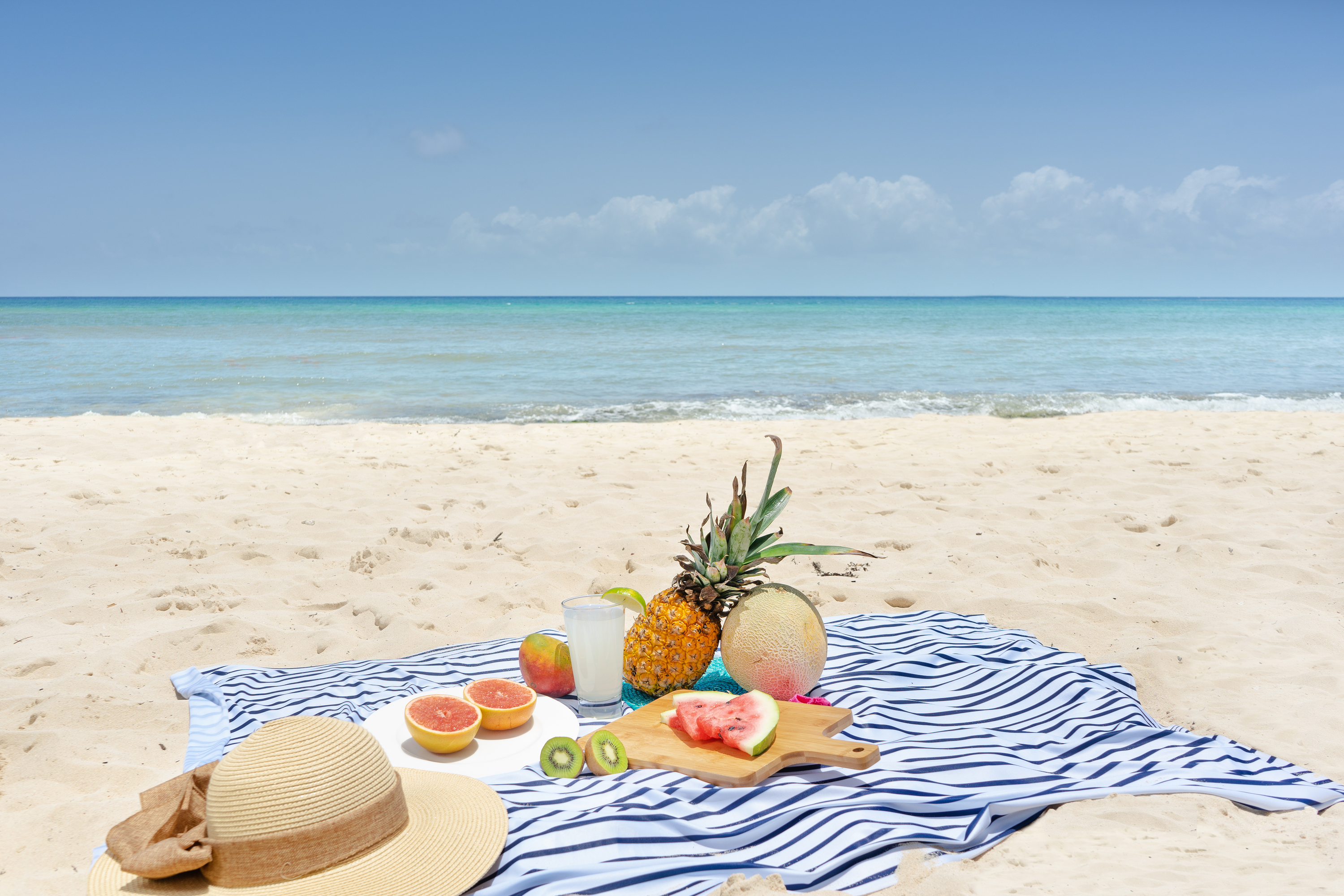a picnic blanket on the beach