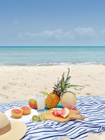 a picnic blanket on the beach