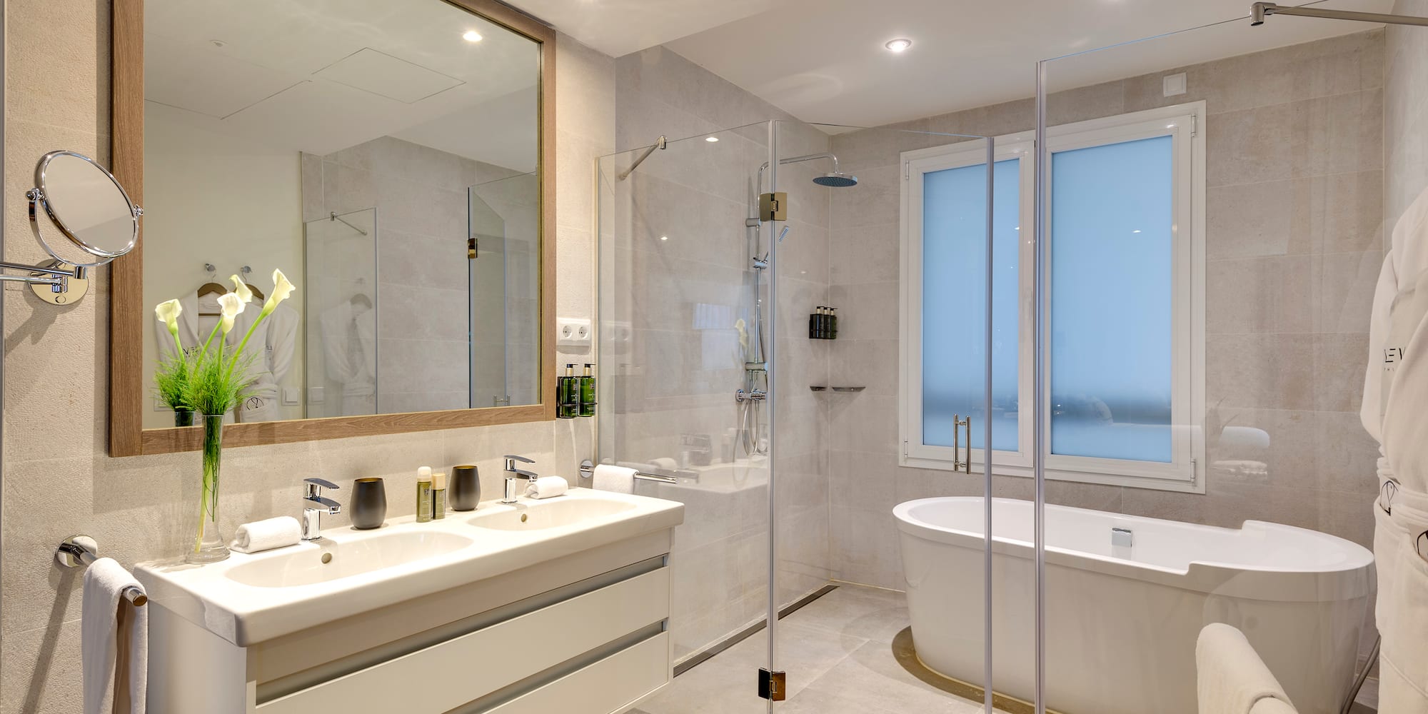 a bathroom with a tub and a shower