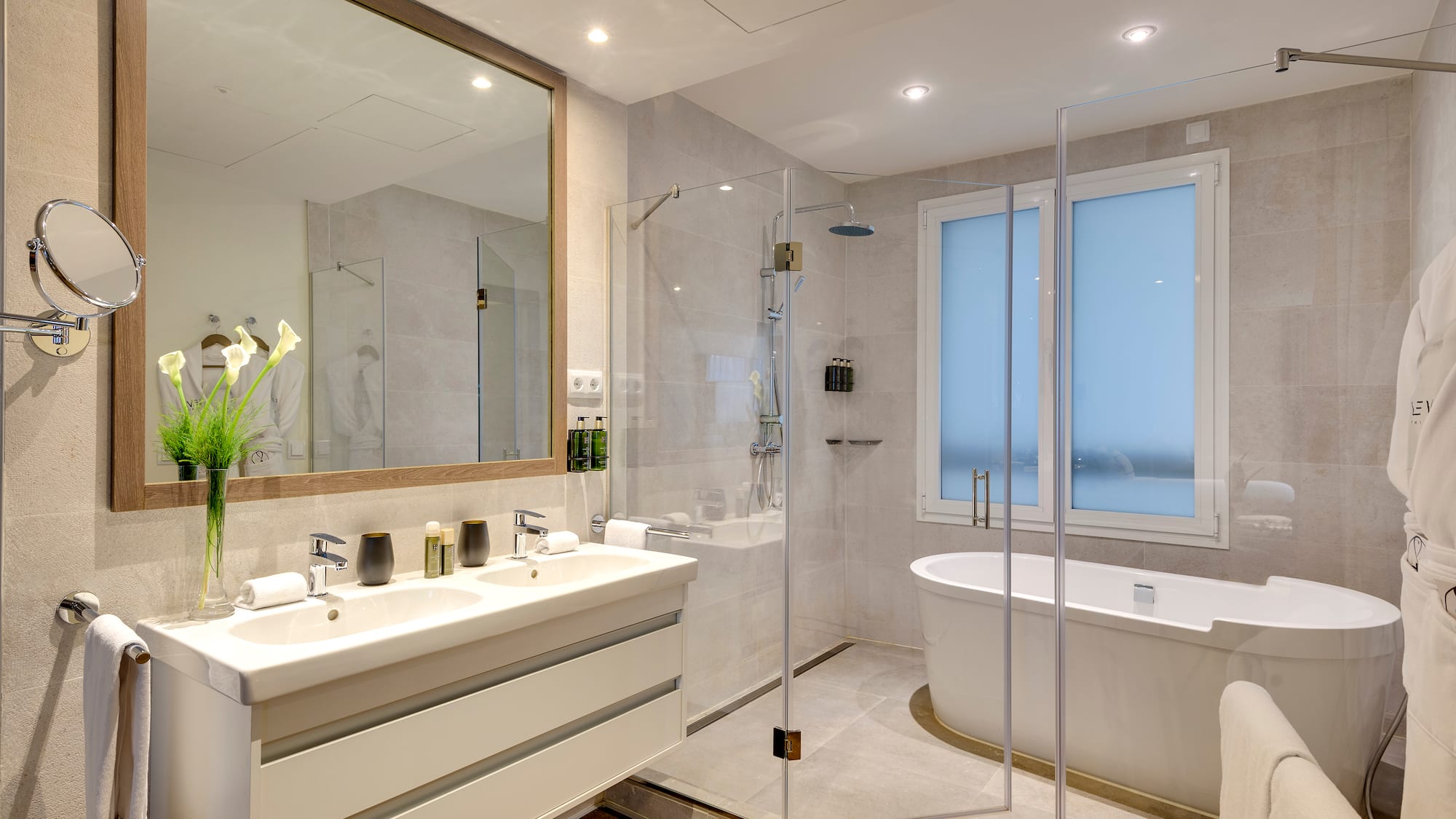 a bathroom with a tub and a shower