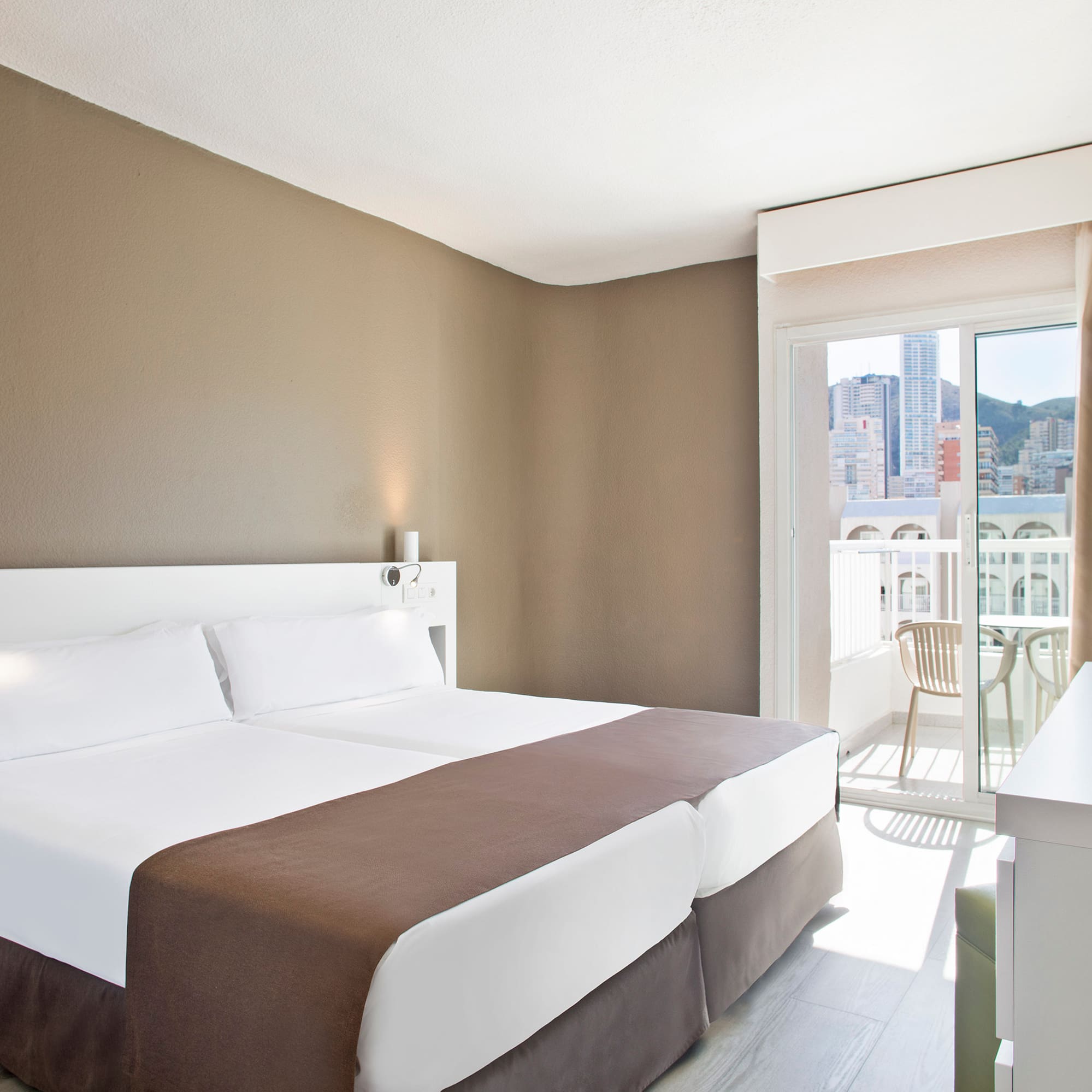 a room with a bed and a table