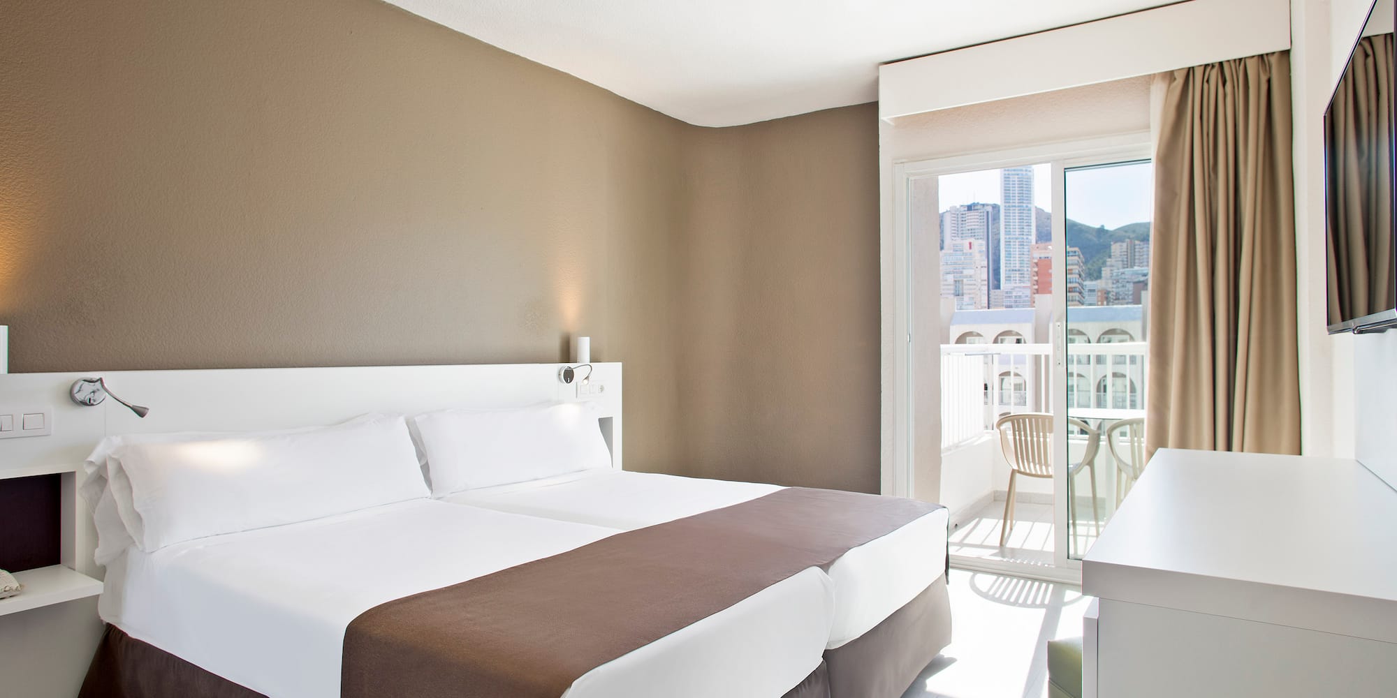 a room with a bed and a table