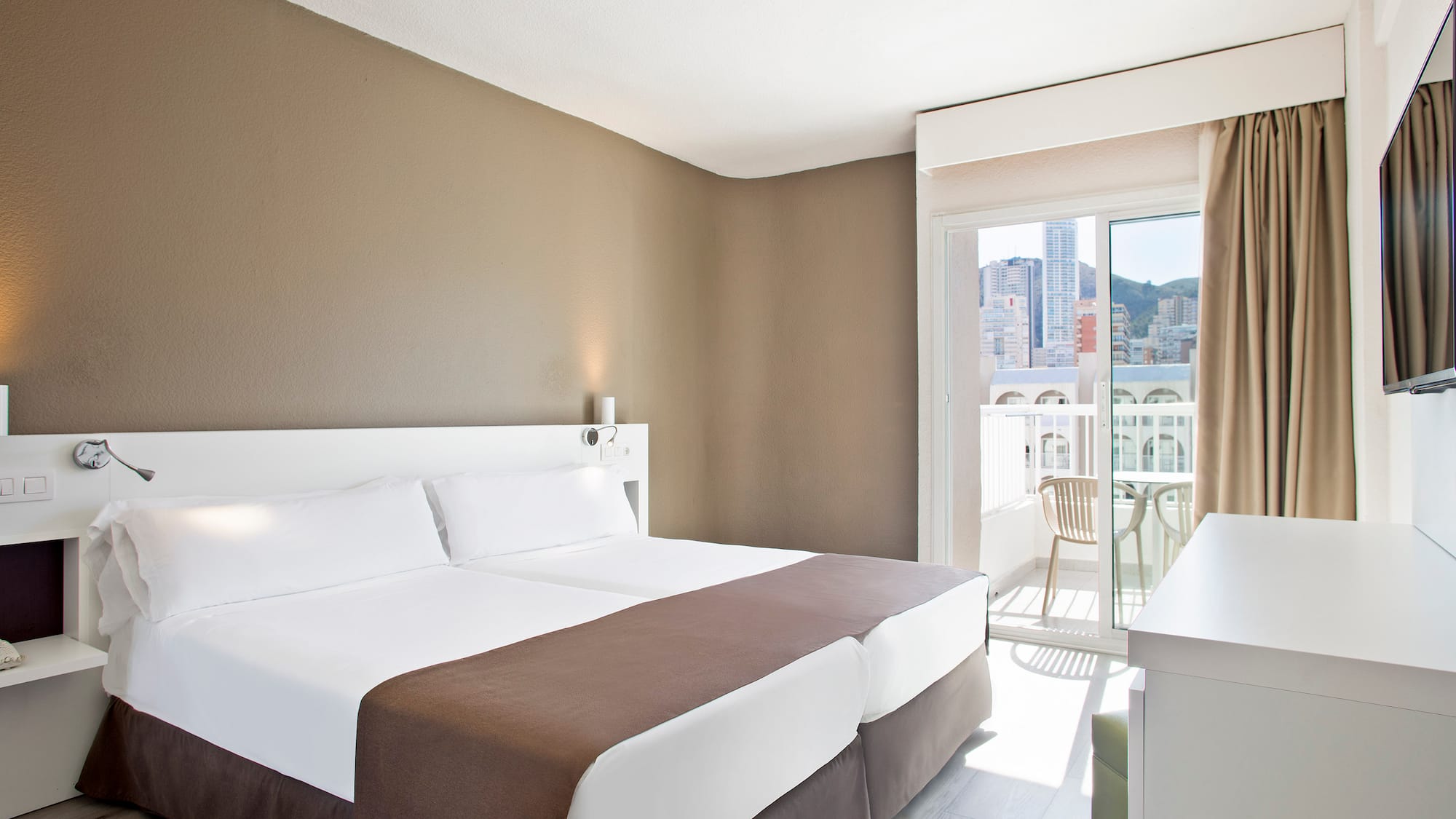 a room with a bed and a table