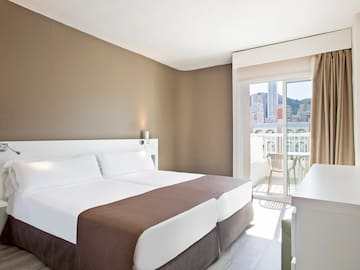 a room with a bed and a table
