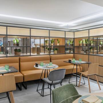 a room with tables and chairs