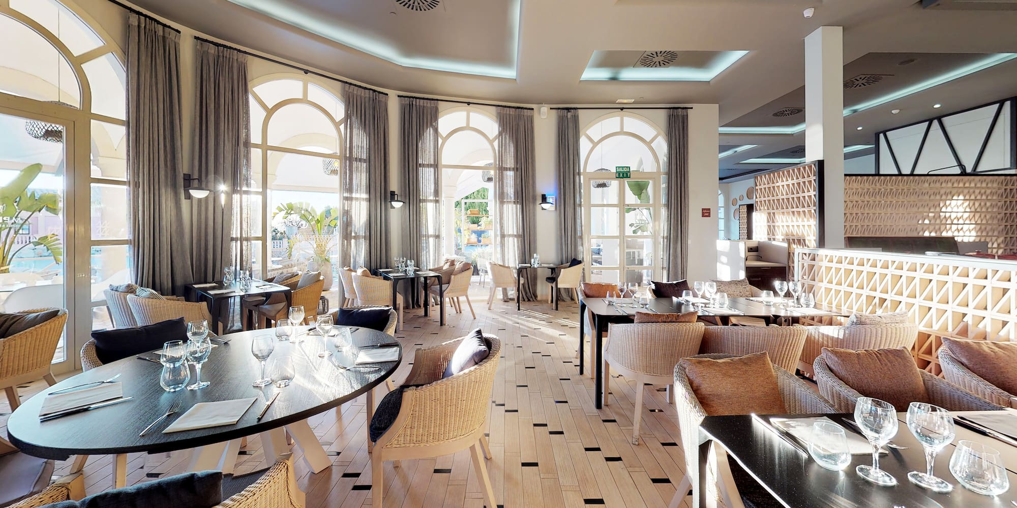 a room with tables and chairs