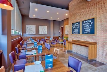 a room with tables and chairs