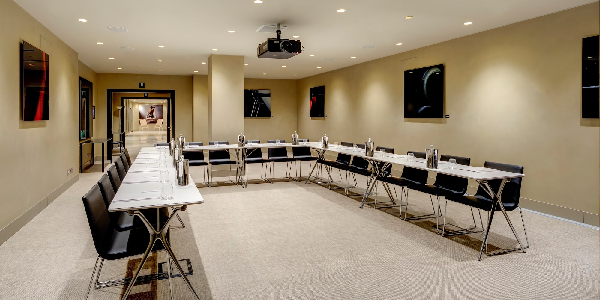 a room with tables and chairs