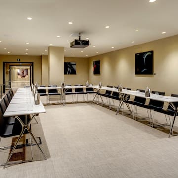 a room with tables and chairs