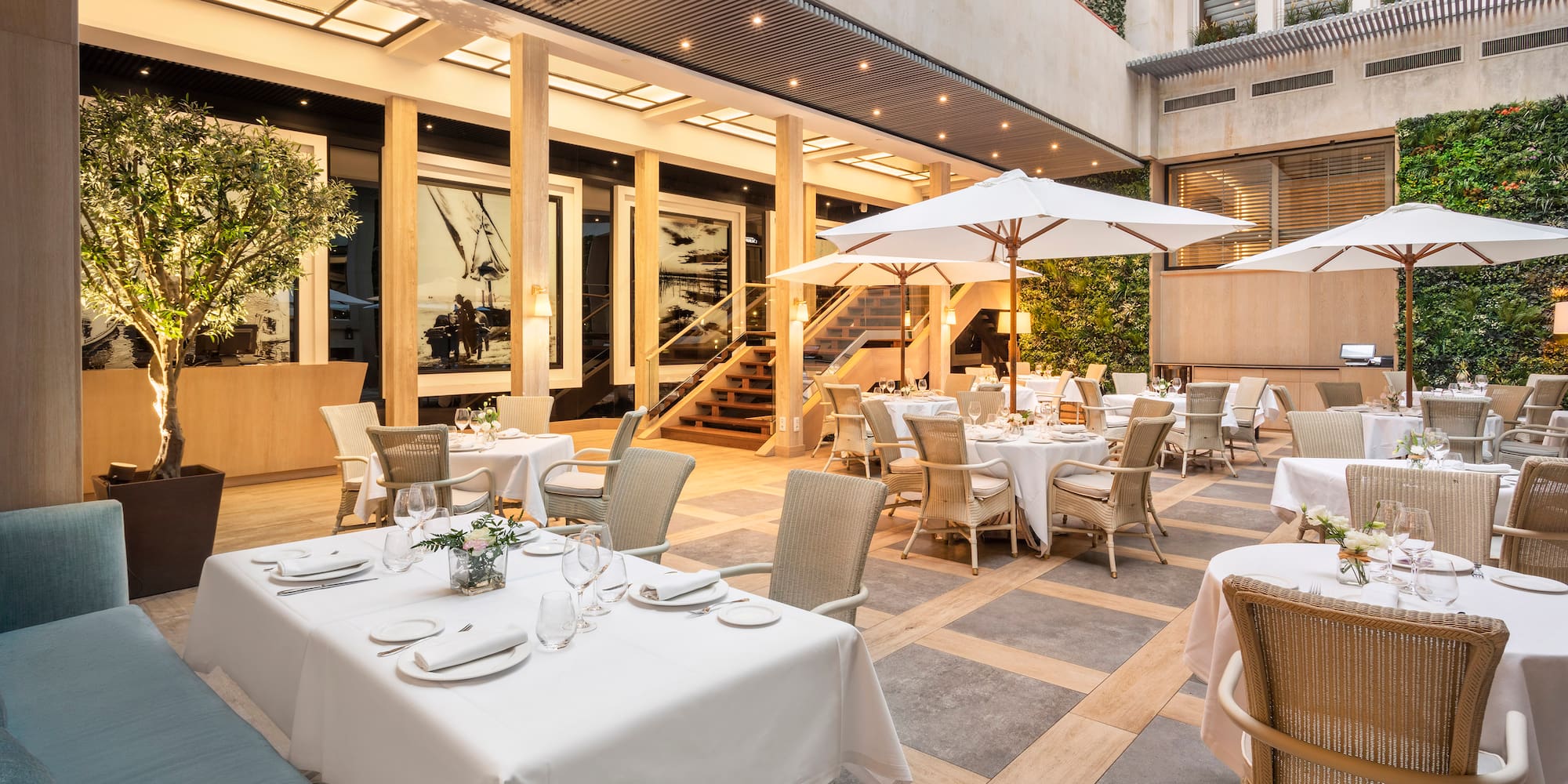 a restaurant with tables and chairs