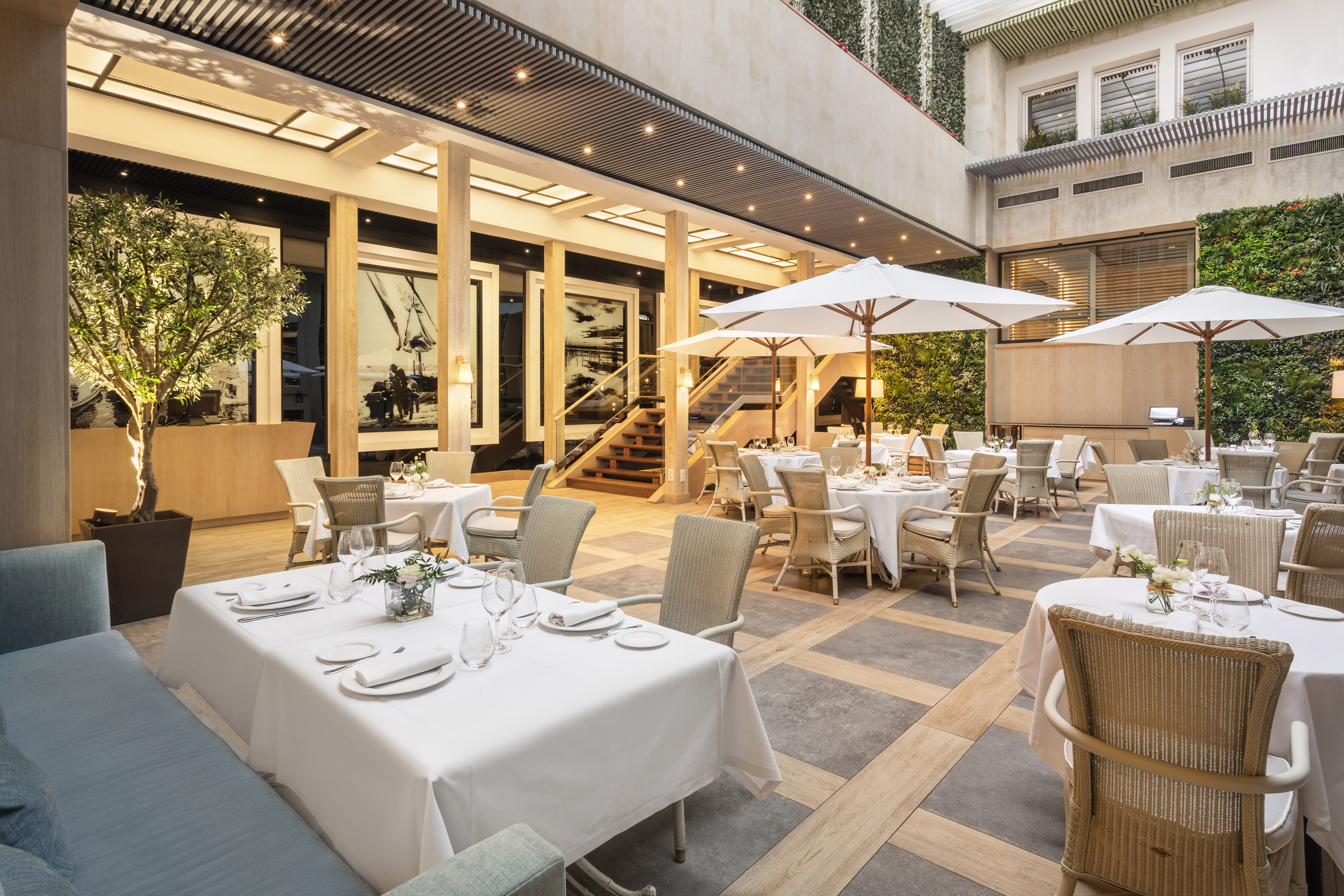 a restaurant with tables and chairs