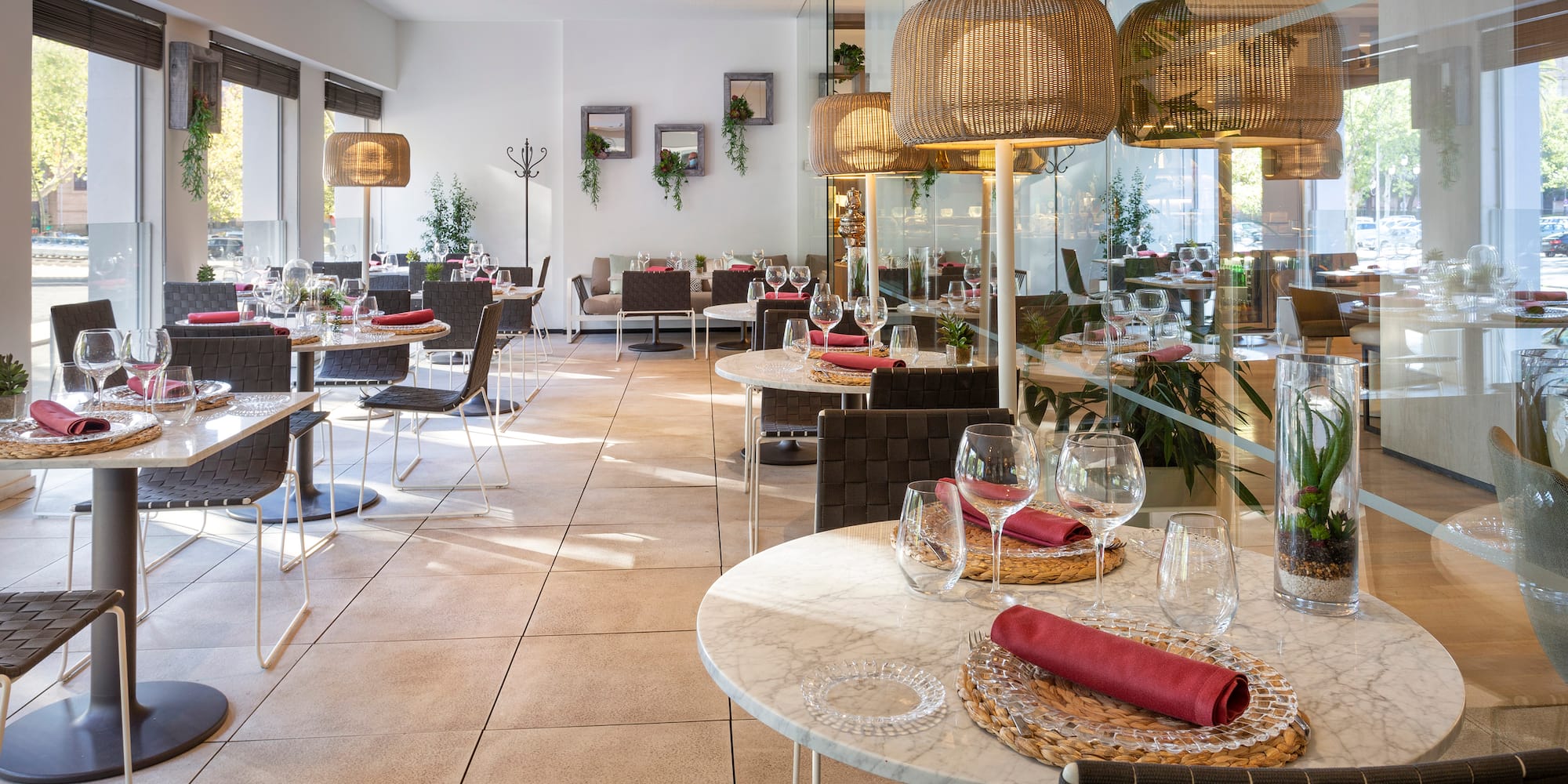 a restaurant with tables and chairs