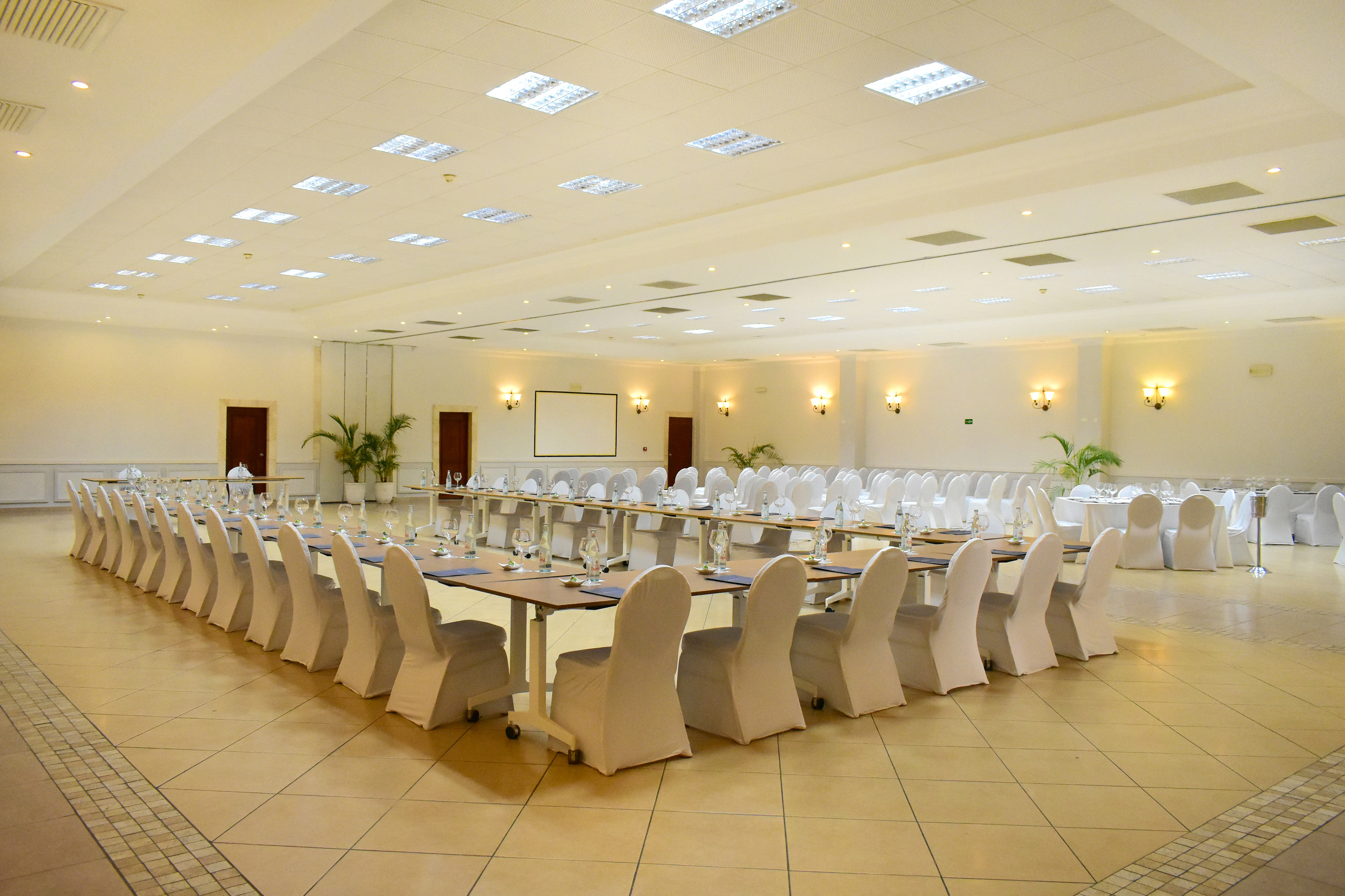 a large room with tables and chairs