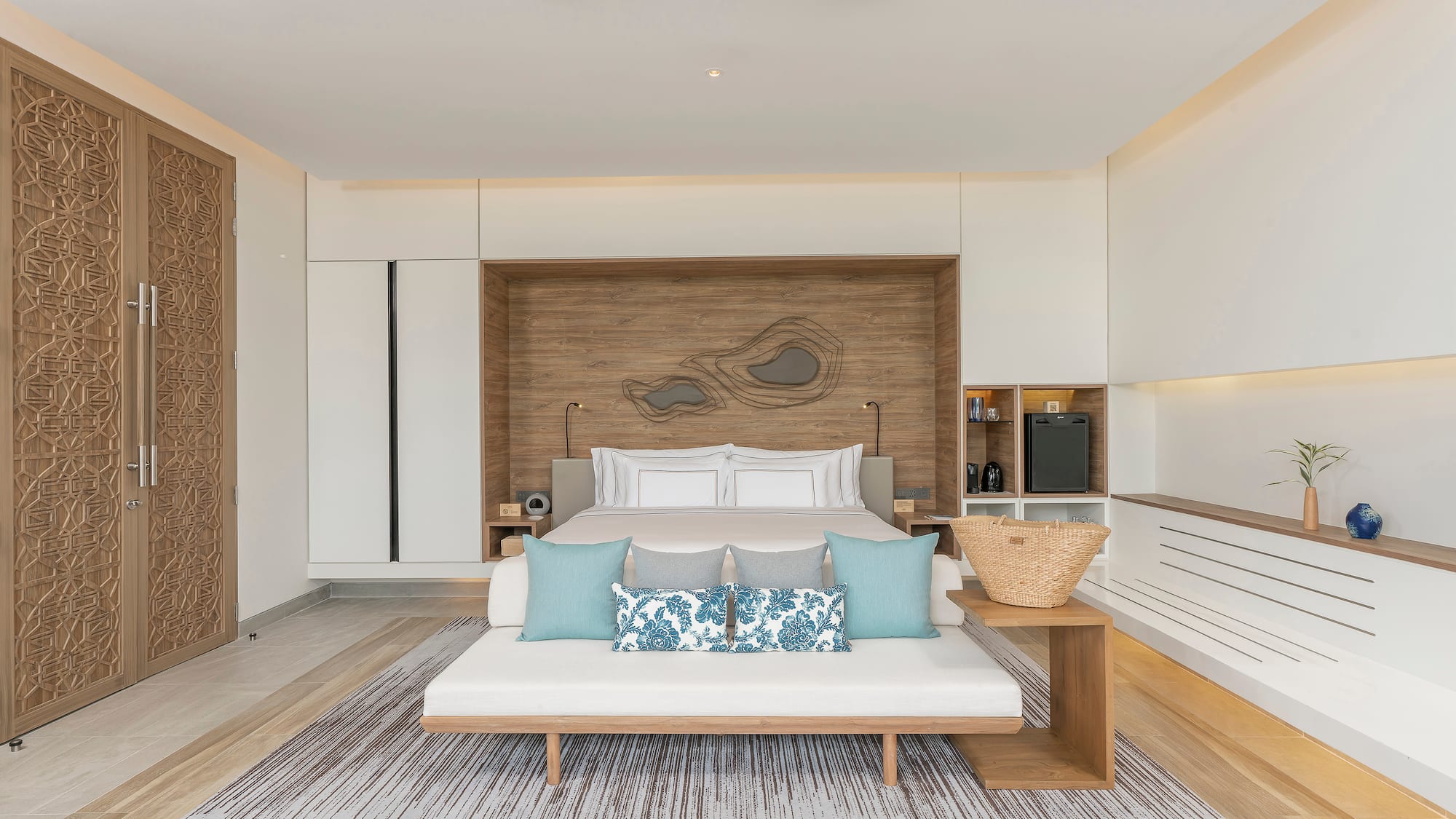 a room with a bed and a fan