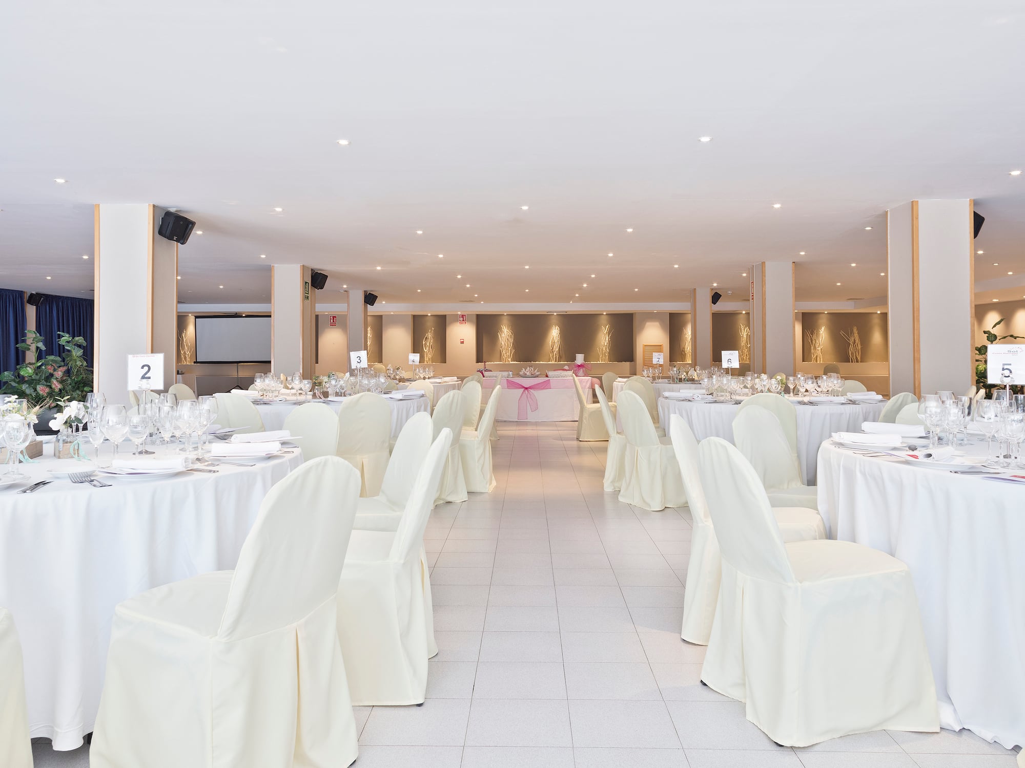 a room with tables and chairs